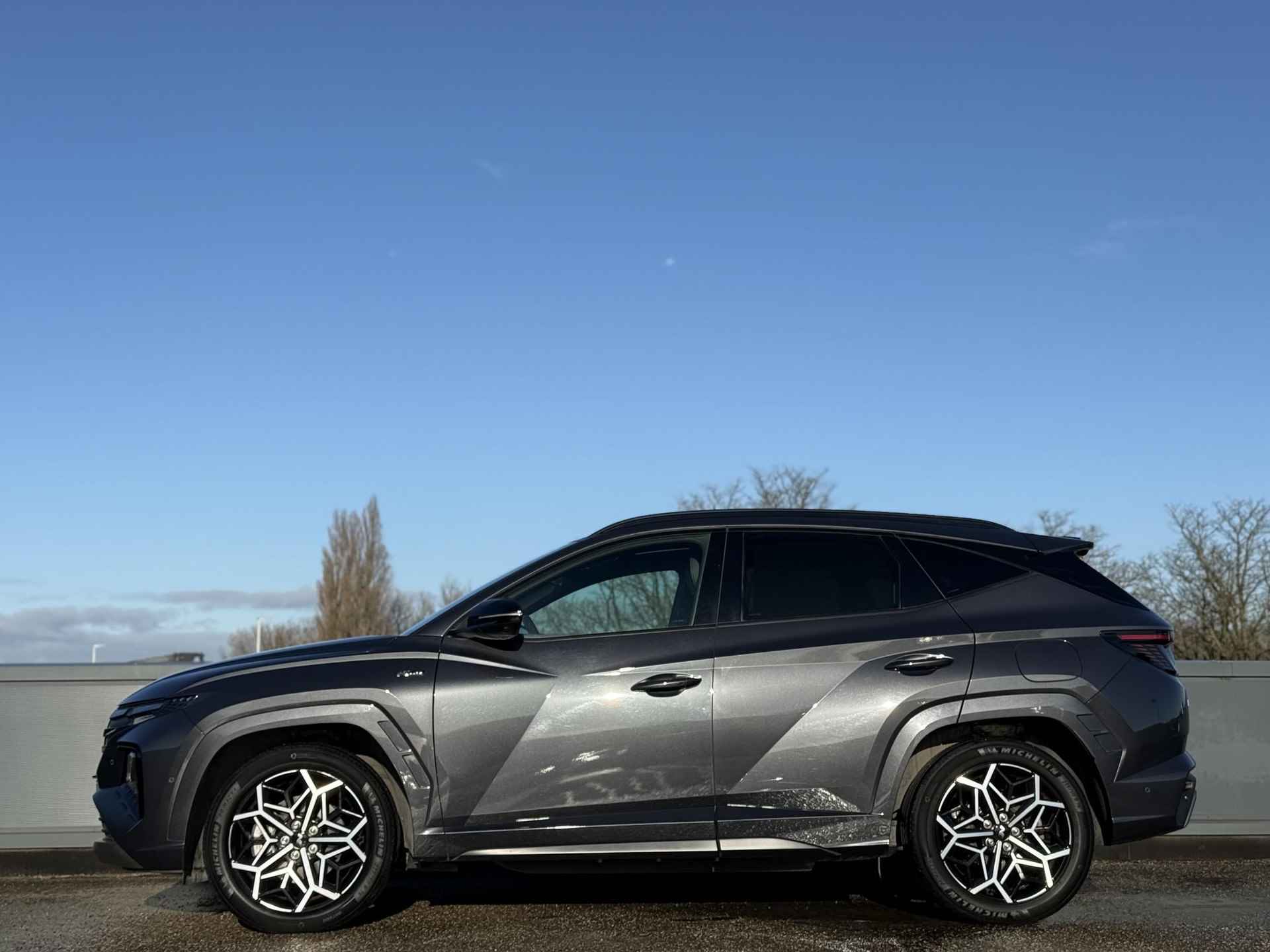 Hyundai Tucson 1.6 T-GDI 265 PK PHEV Premium 4WD | Schuifkanteldak 'Pano' | Alcantara | Blind spot camera | N-Line Pack | Vierwielaandrijving | - 3/45