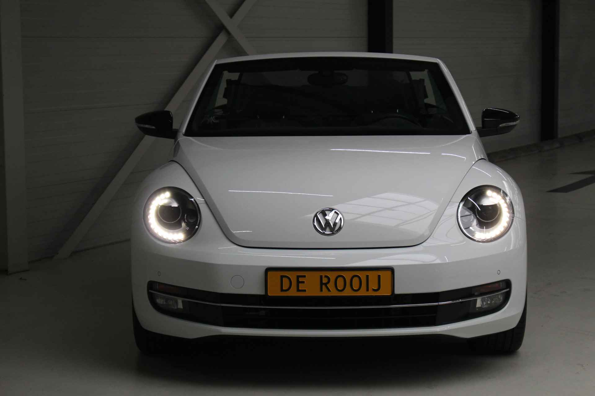 Volkswagen Beetle Cabriolet 1.2 TSI Club 105PK Navigatie | 18" Twister velgen | Xenon | Stoelverwarming | El. inklapbare spiegels . - 7/29