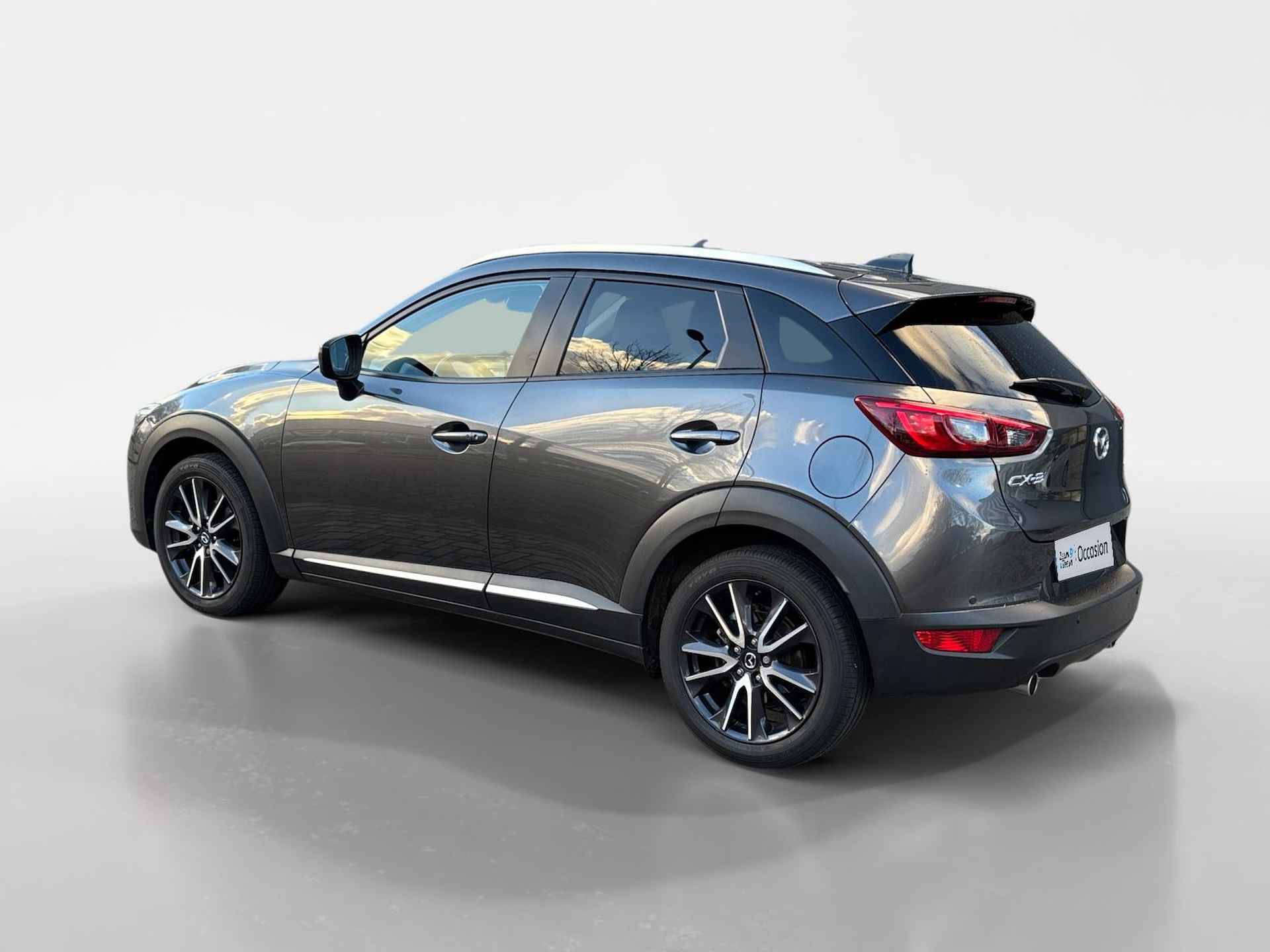 Mazda CX-3 2.0 SkyActiv-G 120 GT-M 1e Eigenaar | Navigatie | Achteruitrijcamera | PDV voor en achter | Leder interieur | Veiligheidssystemen - 12/29