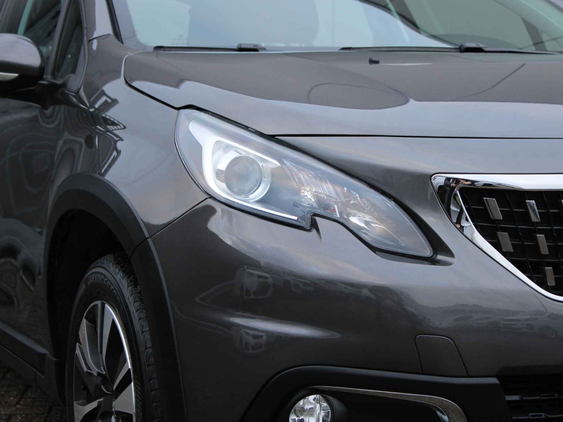 Peugeot 2008 1.2 PureTech Allure Automaat | Navi / Camera / Climate - 25/27