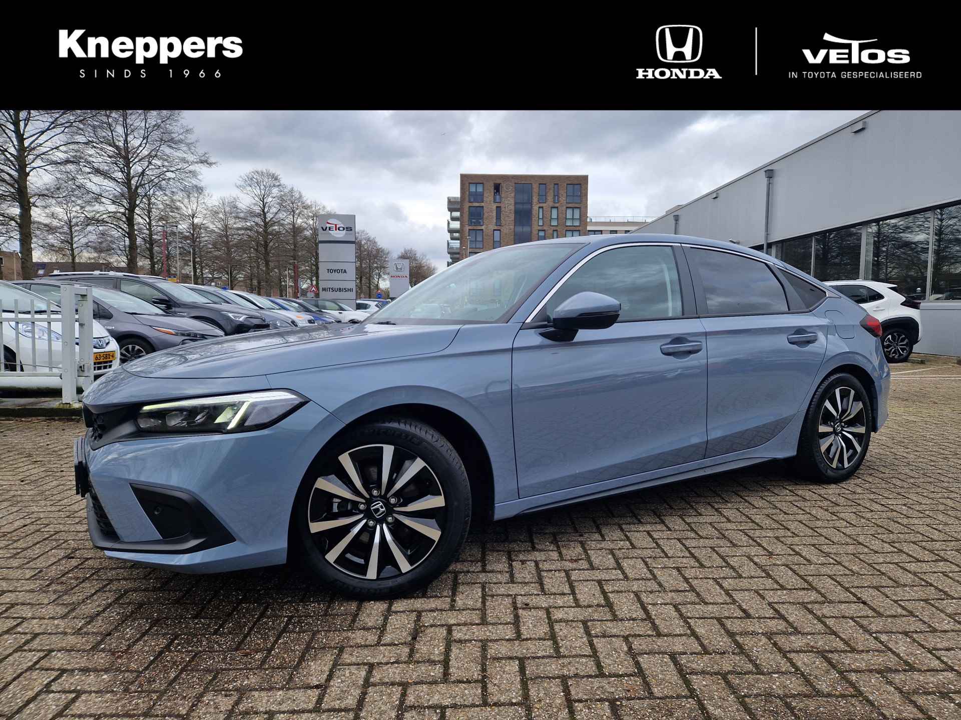 Honda Civic 2.0 e:HEV Elegance SUMMERDEAL Dodehoek detectie, verwarmde stoelen , All-in Rijklaarprijs - 1/3