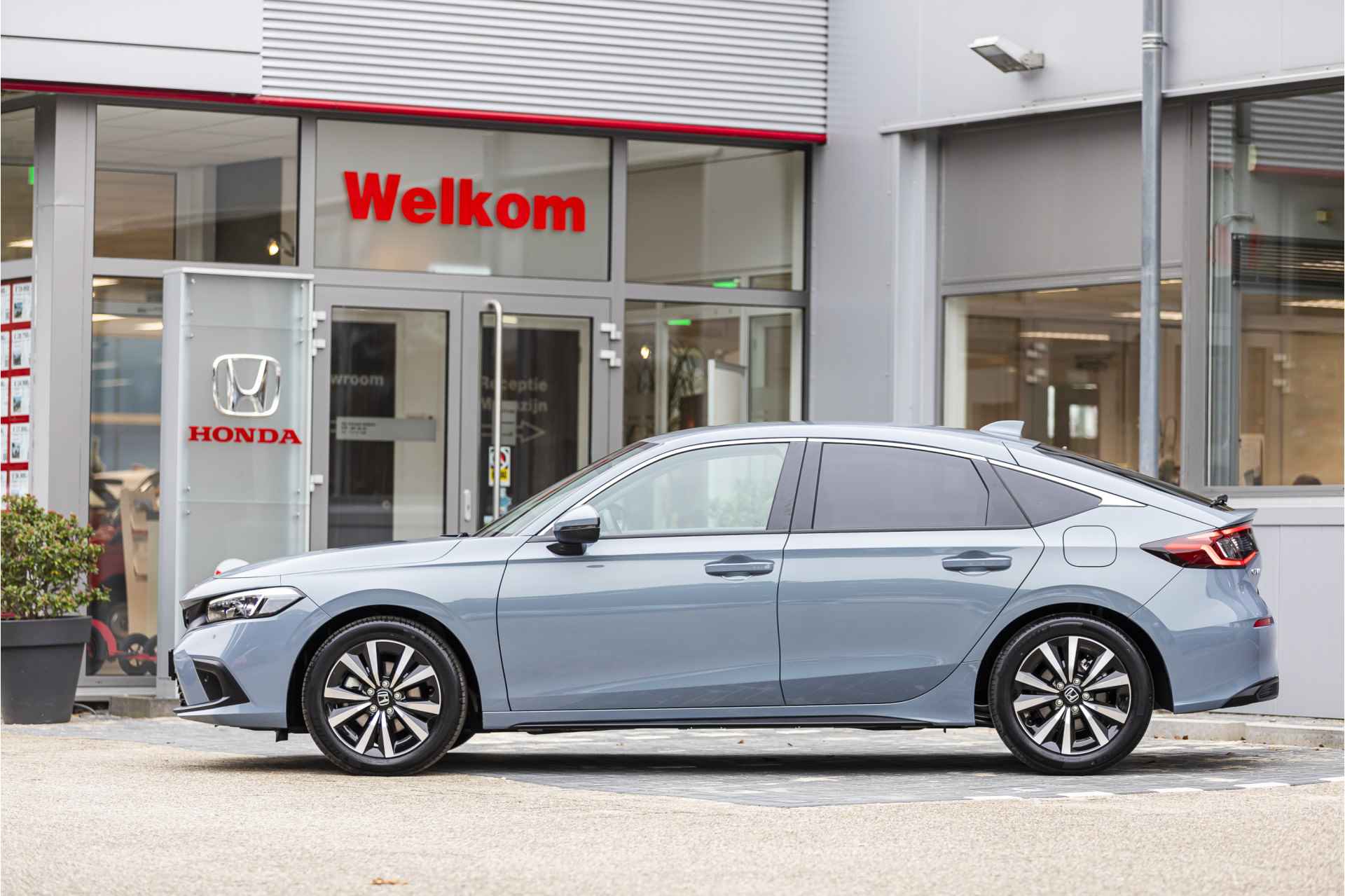 Honda Civic 2.0 e:HEV Elegance Dodehoek detectie, verwarmde stoelen , All-in Rijklaarprijs - 35/44