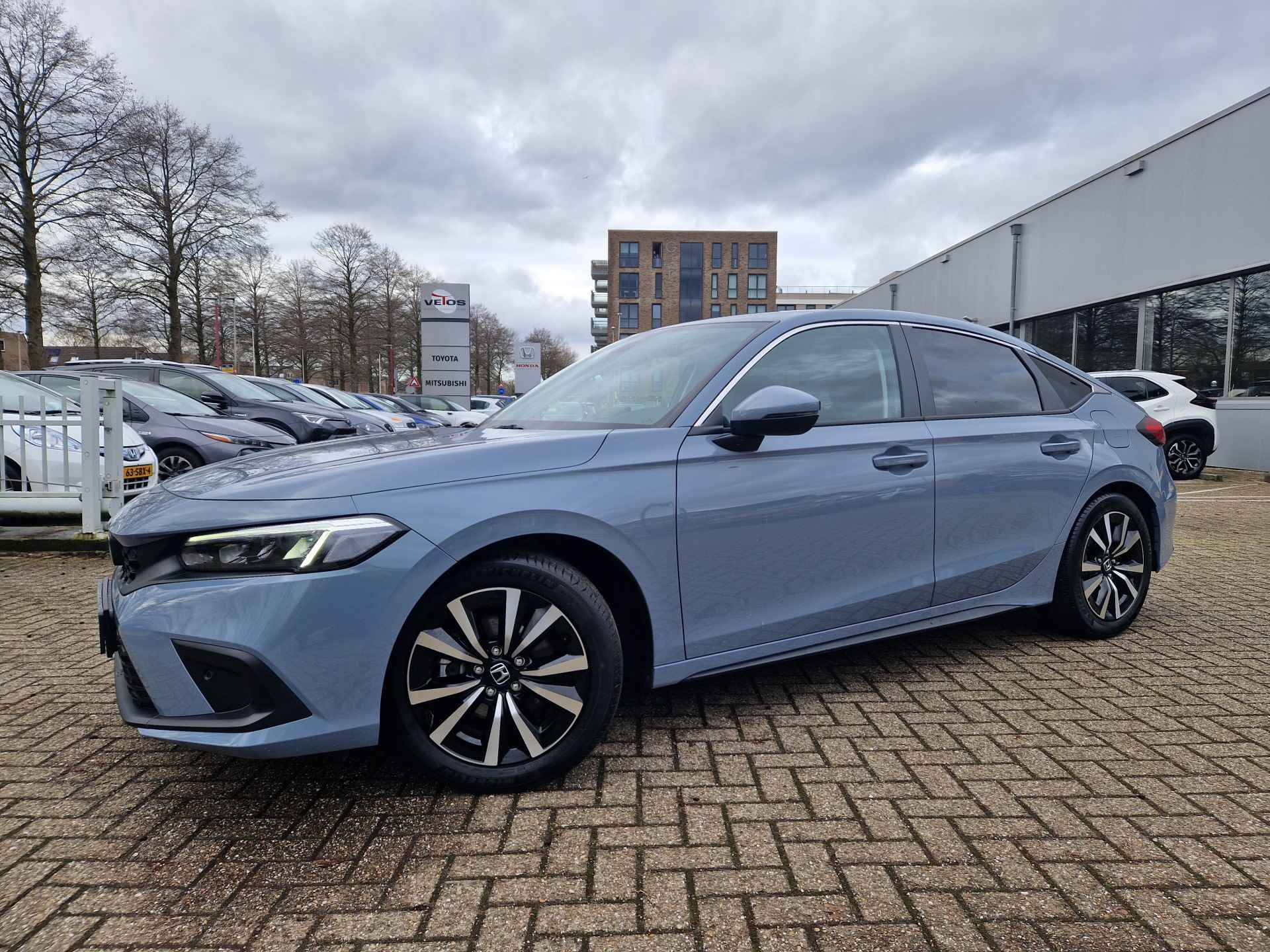 Honda Civic 2.0 e:HEV Elegance Dodehoek detectie, verwarmde stoelen , All-in Rijklaarprijs - 42/44