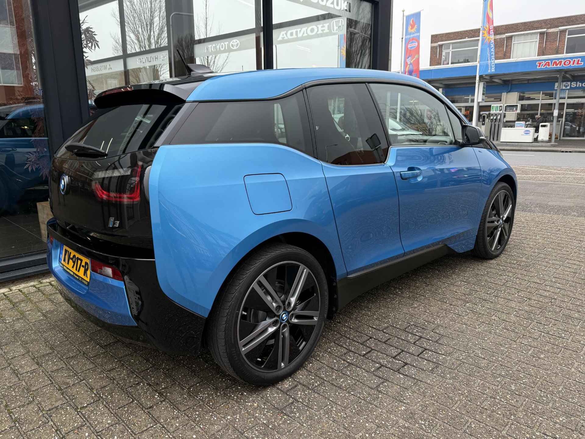 BMW i3 High Executive 94Ah 33 kWh LED / Leder / Warmtepomp / Navigatie / Alu 20 inch - 4/16