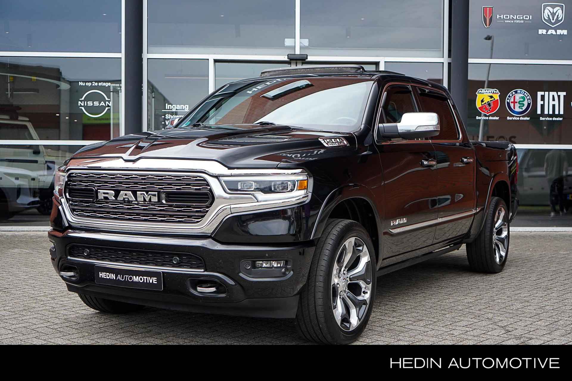 Dodge RAM 5.7 V8 Limited | Ram-Boxen | LPG | Luchtvering | 360° Camera, Adaptive Cruise + Parkeersensoren | Tri-fold cover | Navigatie / AppleCarplay & AndroidAuto - 1/36