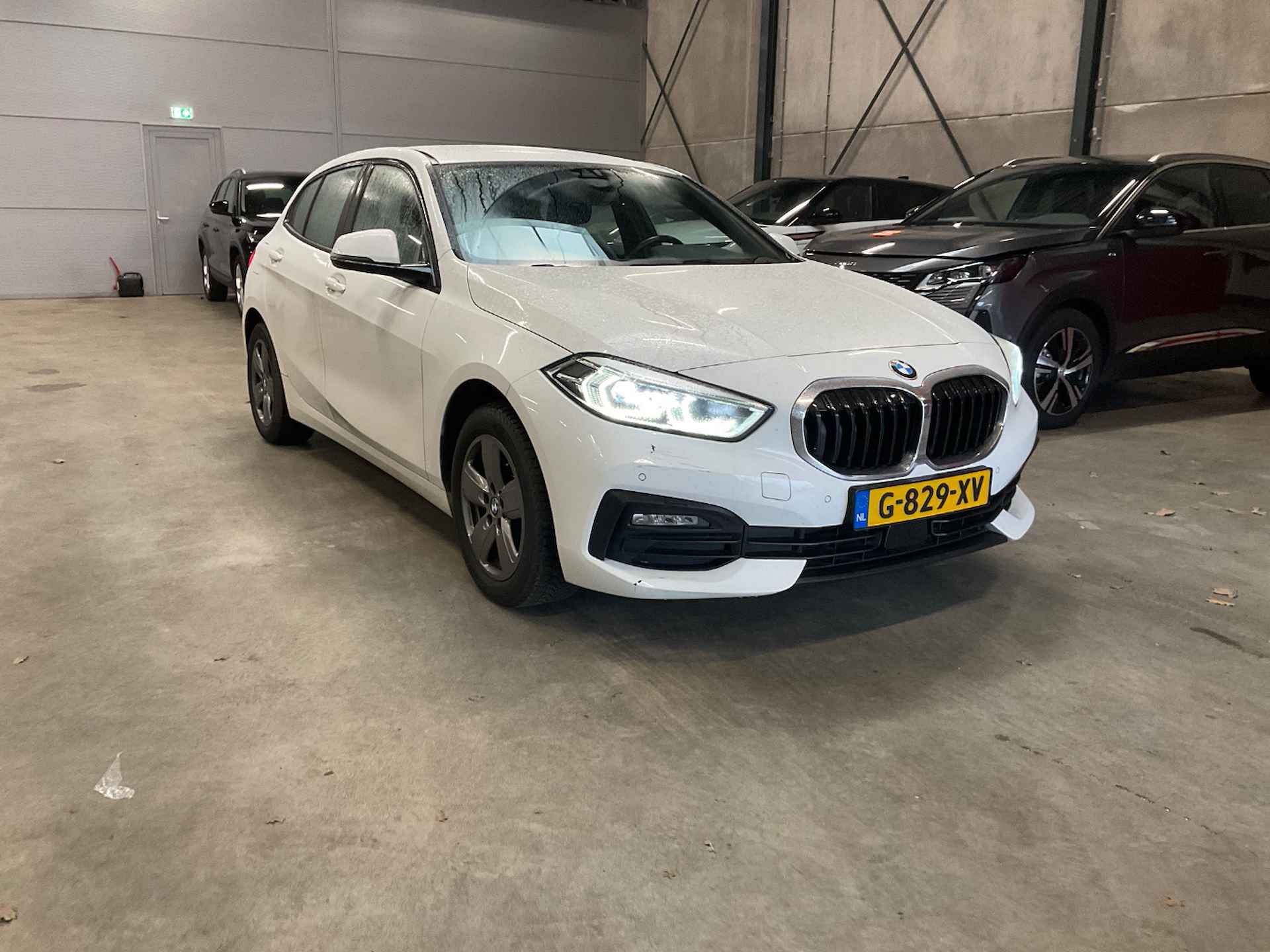 BMW 1-serie 118i Executive Edition automaat | Navi | Carplay | Clima | Led | Cruise | Komt binnenkort binnen! - 2/6