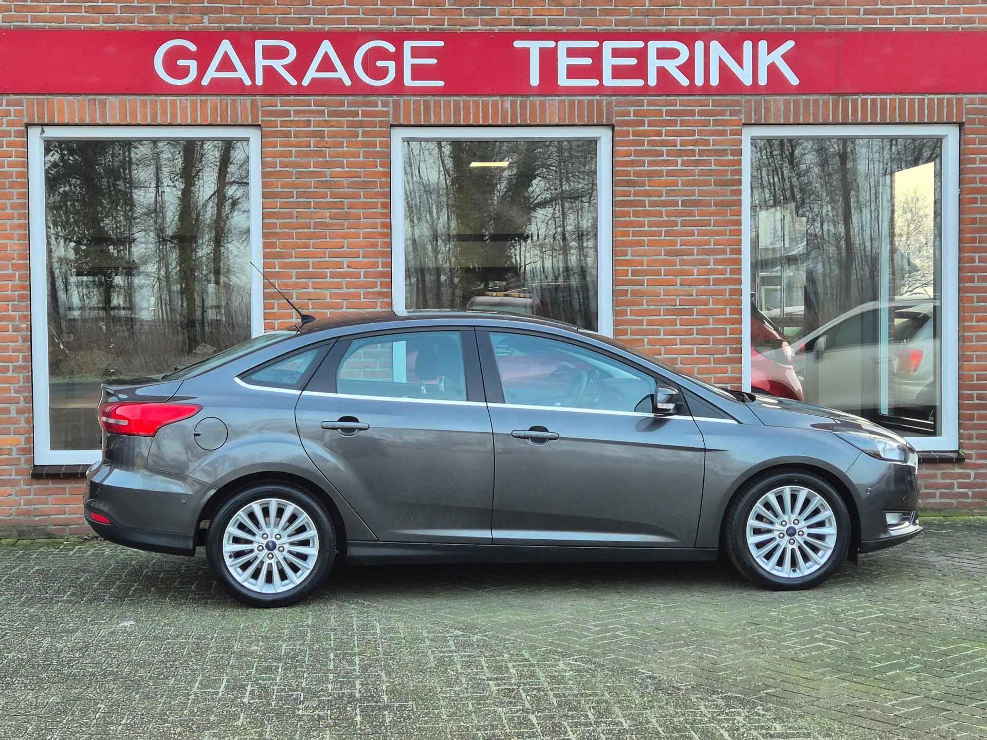 Ford Focus 1.0 Titanium Edition 125PK 4drs clima, cruise, navi, pdc, parkassist, lmv RIJKLAAR - 18/20