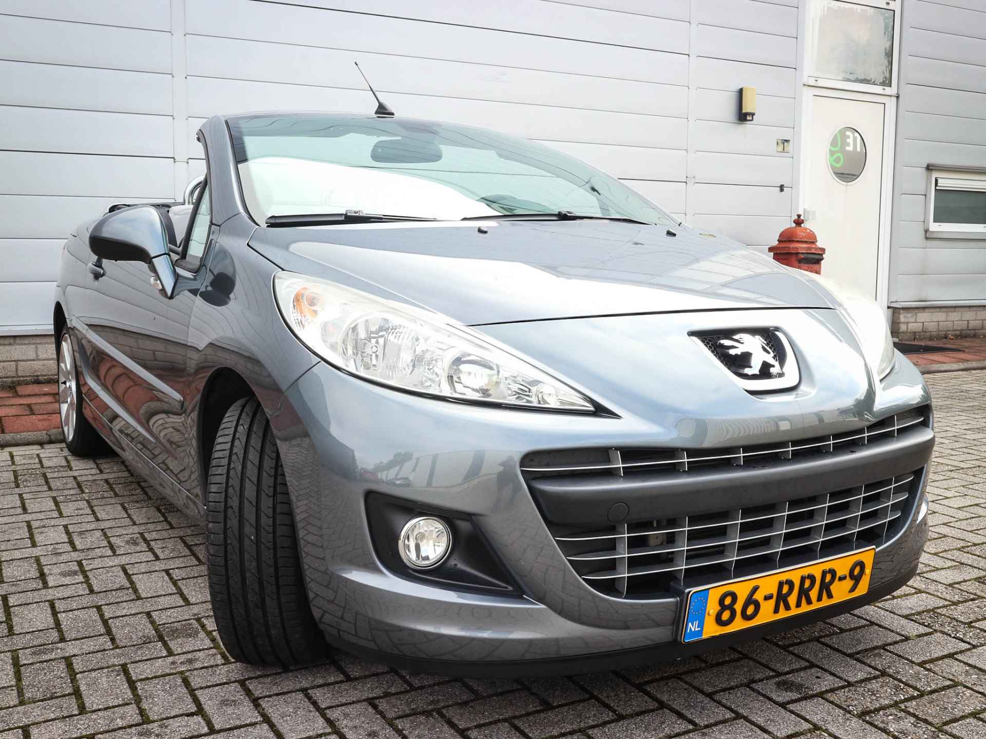 Peugeot 207 CC 1.6 VTi Griffe | Clima | Cruise | Leer | Stoelverwarming | Pdc | 17 inch | - 26/44