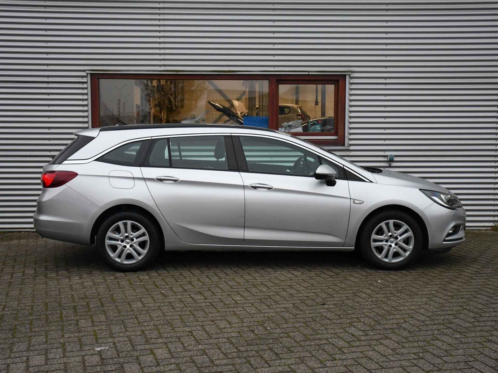 Opel Astra Sports Tourer Business+ 1.0 105pk NAVI | APPLE CARPLAY | PDC ACHTER | DAB | USB | 12MND GARANTIE - 3/29