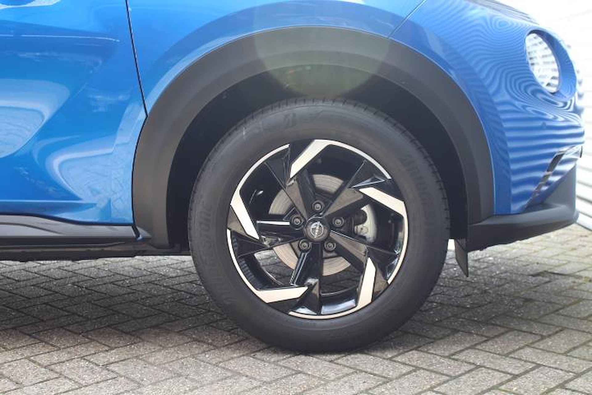 Nissan Juke 1.0 DIG-T N-Connecta | ACTIEKORTING | AUTOMAAT | Cruise Control | Navigatie | Climate Control | Achteruitrij Camera | 17" LM Velgen | Keyless Entry - 4/45