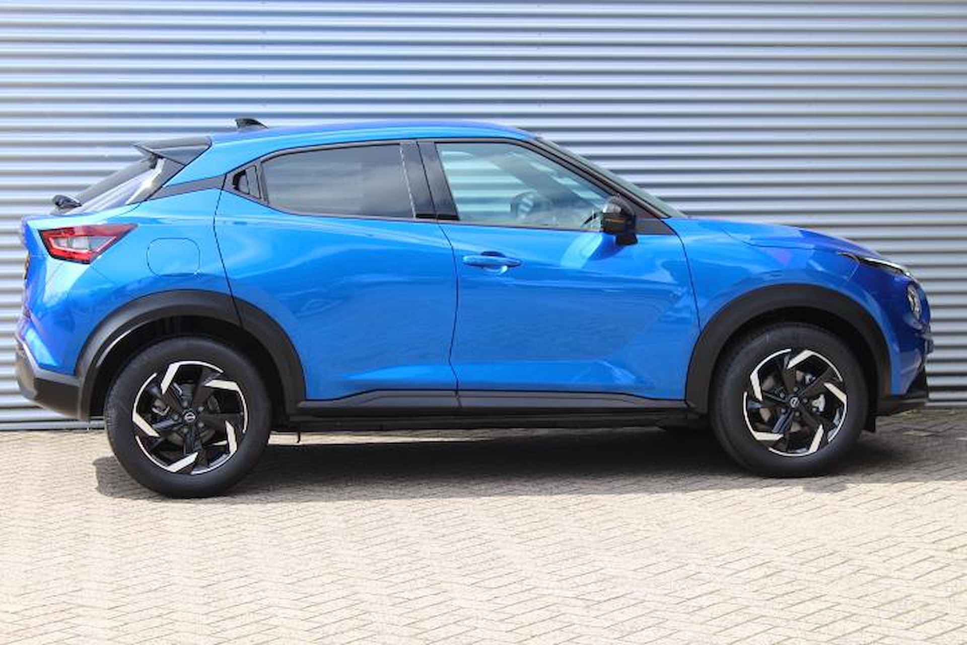 Nissan Juke 1.0 DIG-T N-Connecta | ACTIEKORTING | AUTOMAAT | Cruise Control | Navigatie | Climate Control | Achteruitrij Camera | 17" LM Velgen | Keyless Entry - 25/45