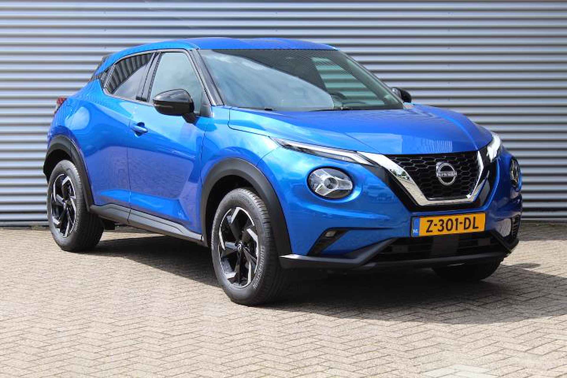 Nissan Juke 1.0 DIG-T N-Connecta | ACTIEKORTING | AUTOMAAT | Cruise Control | Navigatie | Climate Control | Achteruitrij Camera | 17" LM Velgen | Keyless Entry - 27/45