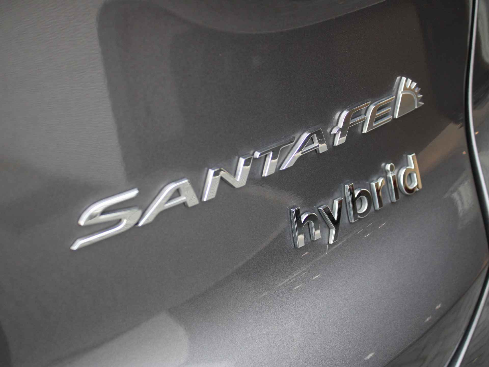 Hyundai Santa Fe 1.6 T-GDI HEV Comfort Smart Sky 7p. 230pk Automaat | Afn. Trekhaak | Schuif-/Kanteldak | Leder | Stoelverwarming | Elektr. Stoel - 37/40