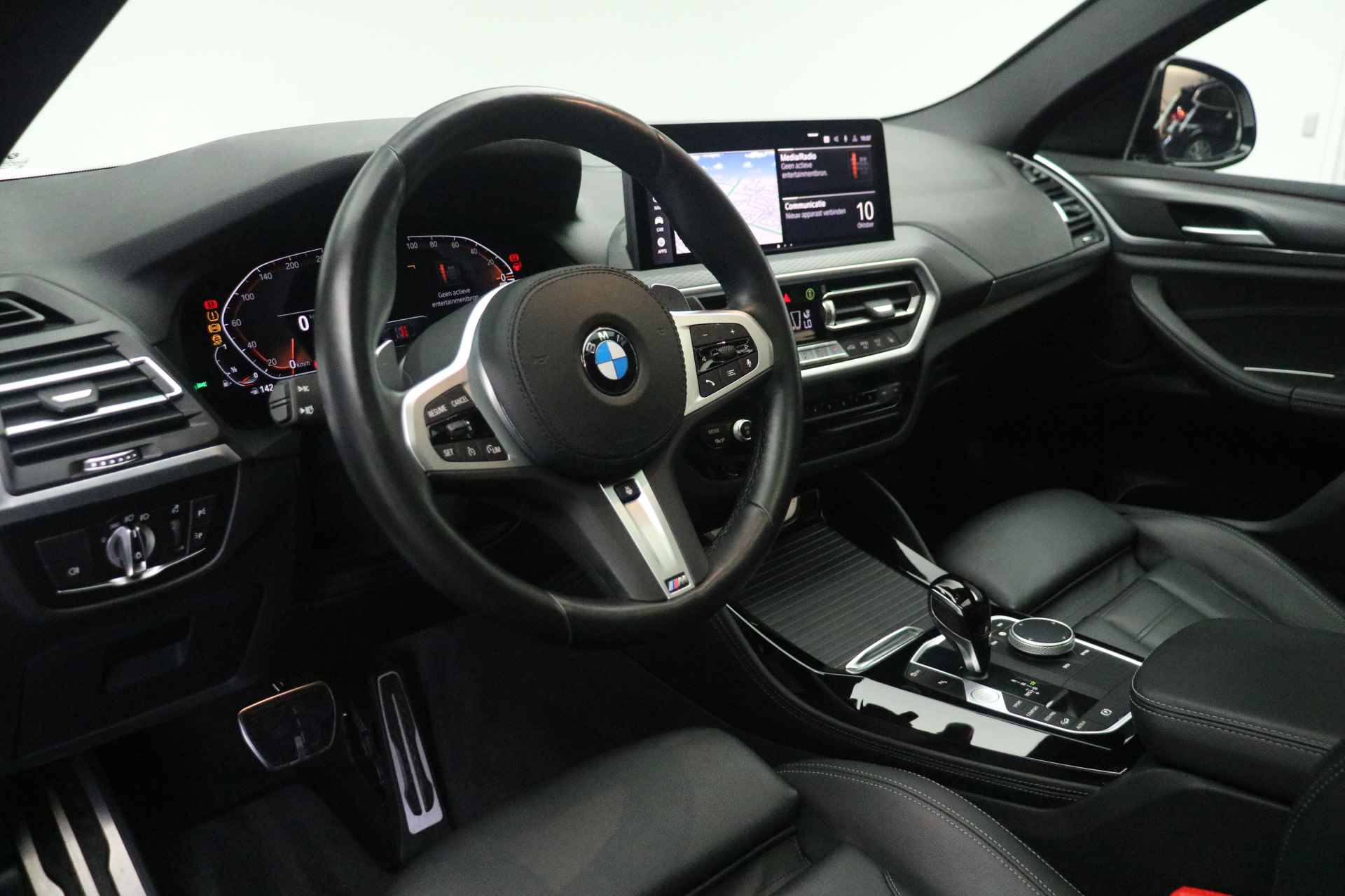 BMW X4 xDrive30i High Executive M Sport Automaat / Panoramadak / Sportstoelen / Stoelverwarming / Laserlight / Parking Assistant / Live Cockpit Professional / M Sportonderstel - 9/28