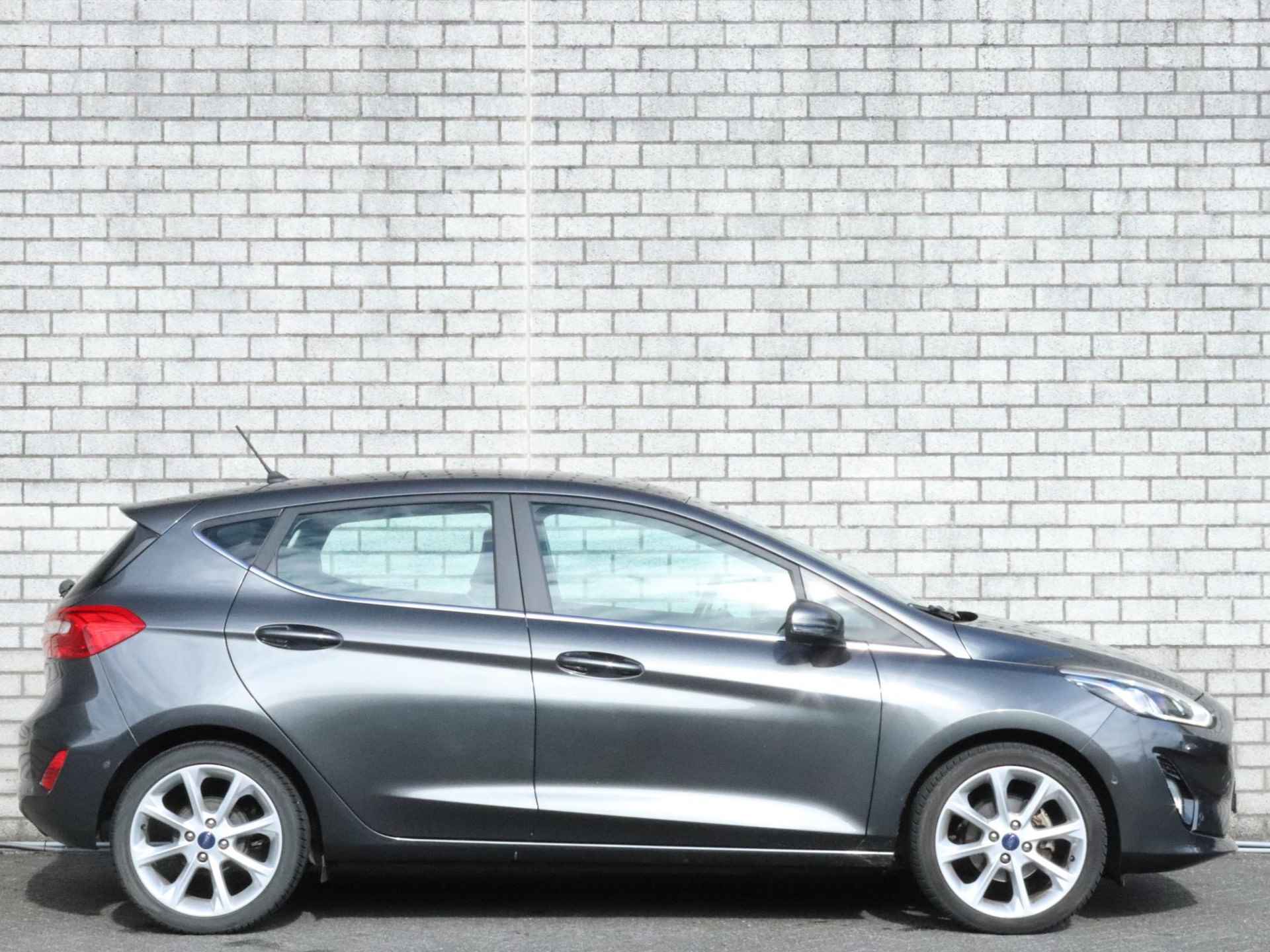 Ford Fiesta 1.0 EcoBoost 100 Titanium | 5-deurs | Navigatie | Apple Carplay | Climate Control | Panoramadak | Camera | Parkeersensoren | LMV 17" | - 7/32