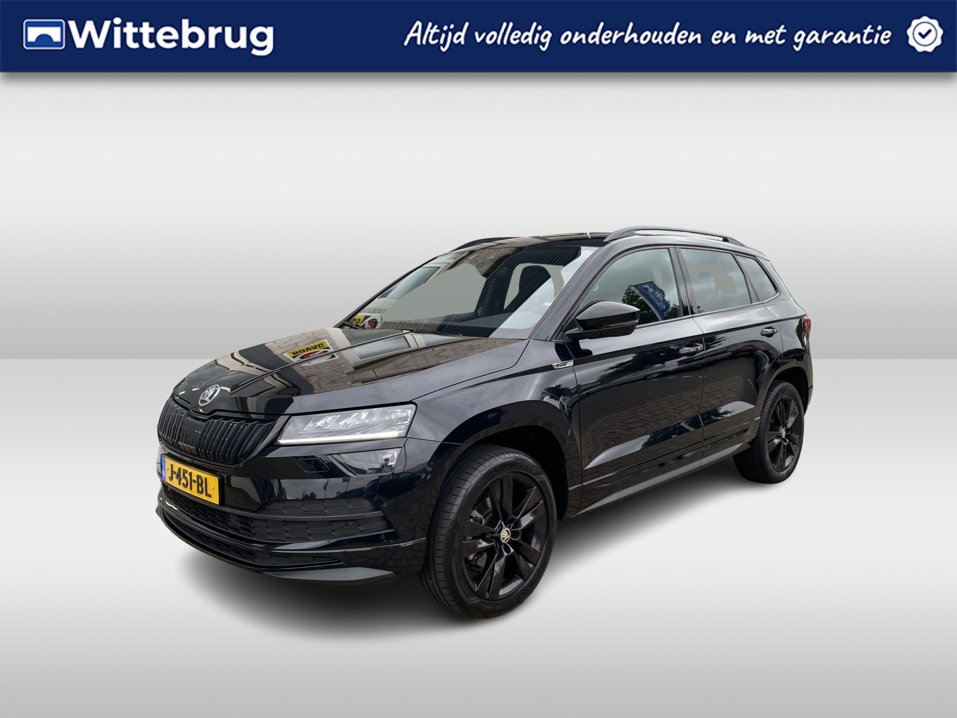 Škoda Karoq 1.5 TSI ACT Sportline Business / AUTOMAAT/ TREKHAAK/ CANTON AUDIO/ DIGITAL DASH/ KEYLESS/ DAB/ NAVI/ SMARTLINK/ CLIMA/ STOELVERWARMING/ CAMERA + SENSOREN/ ACC