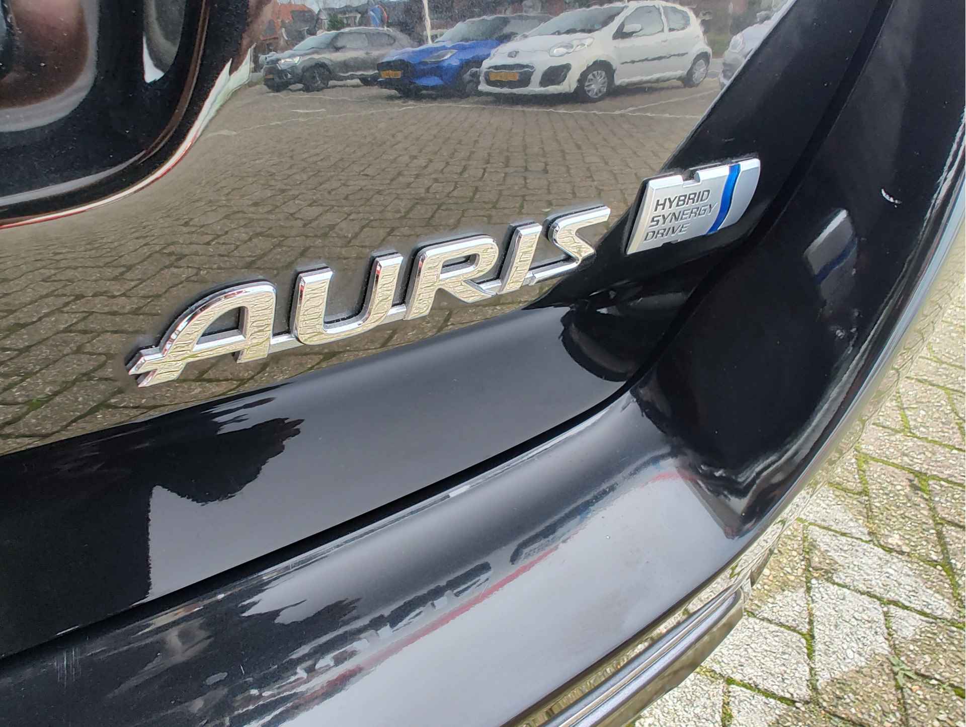 Toyota Auris Touring Sports 1.8 HYBRID LEASE Panoramadak | Cruise Control | Parkeercamera - 34/38