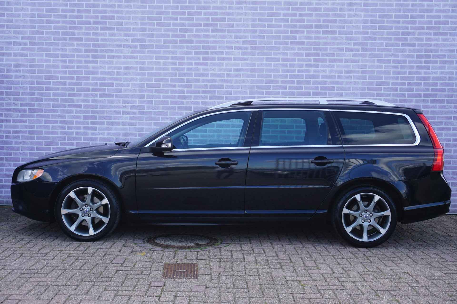 Volvo V70 3.0 T6 AWD Summum | geïntegreerde kinderzitjes | 18" | Schuif/kantel dak | Xenon | AUX | - 30/31