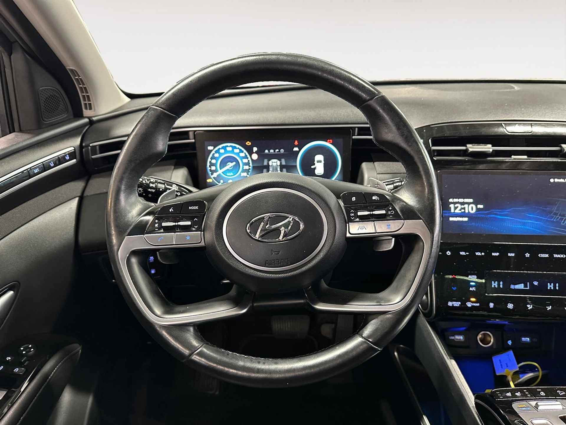 Hyundai Tucson 1.6 T-GDI PHEV Premium Sky 4WD | Full options! | Panoramadak | Navi | Stoelverwarming | Trekhaak - 8/28