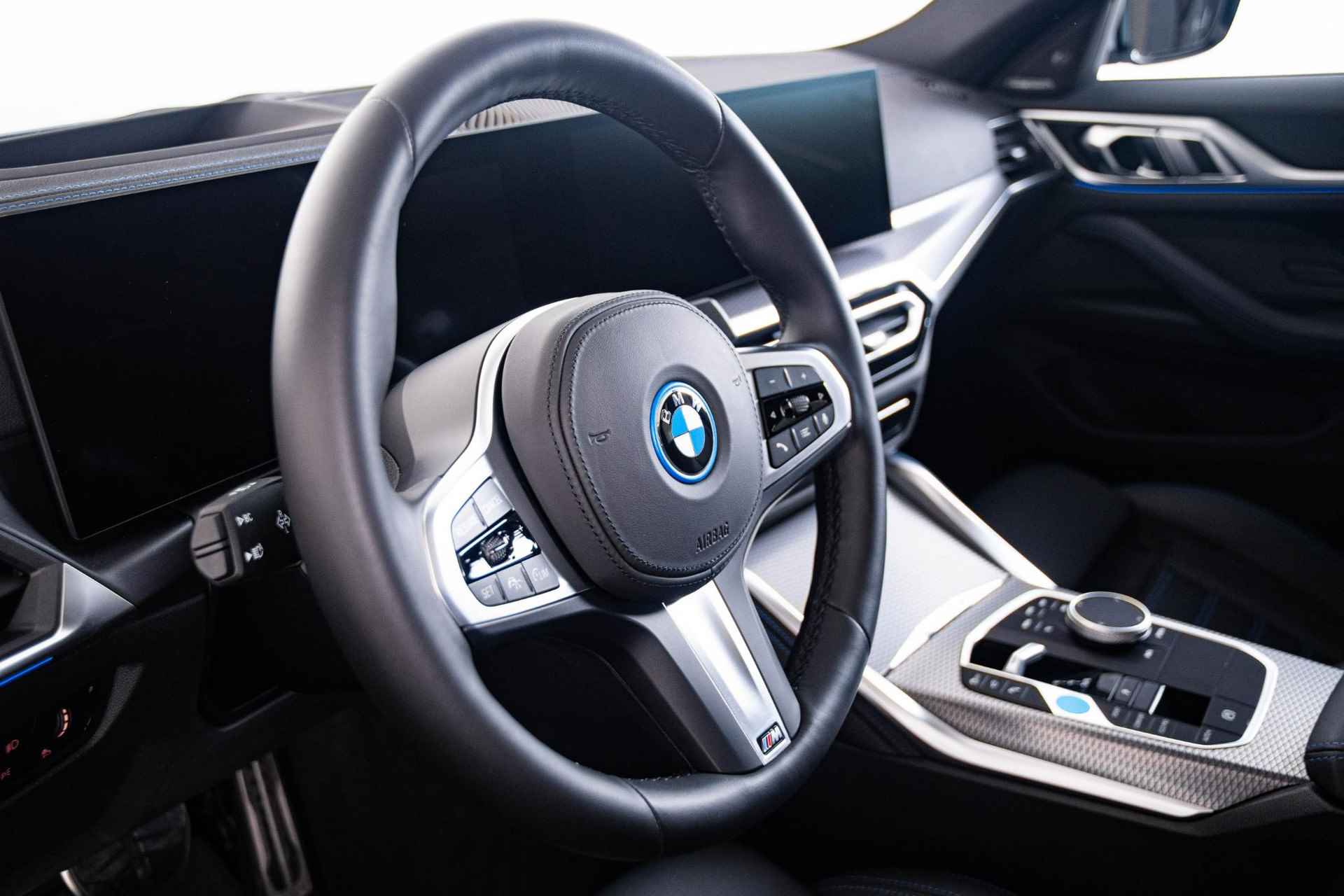 BMW i4 eDrive40 High Executive 84 kWh M-sport - Schuifdak - Harman Kardon - Laserlight - Active Cruise Control - Parking Assistant Plus - Lendensteun - 19 inch - Leder - 28/65