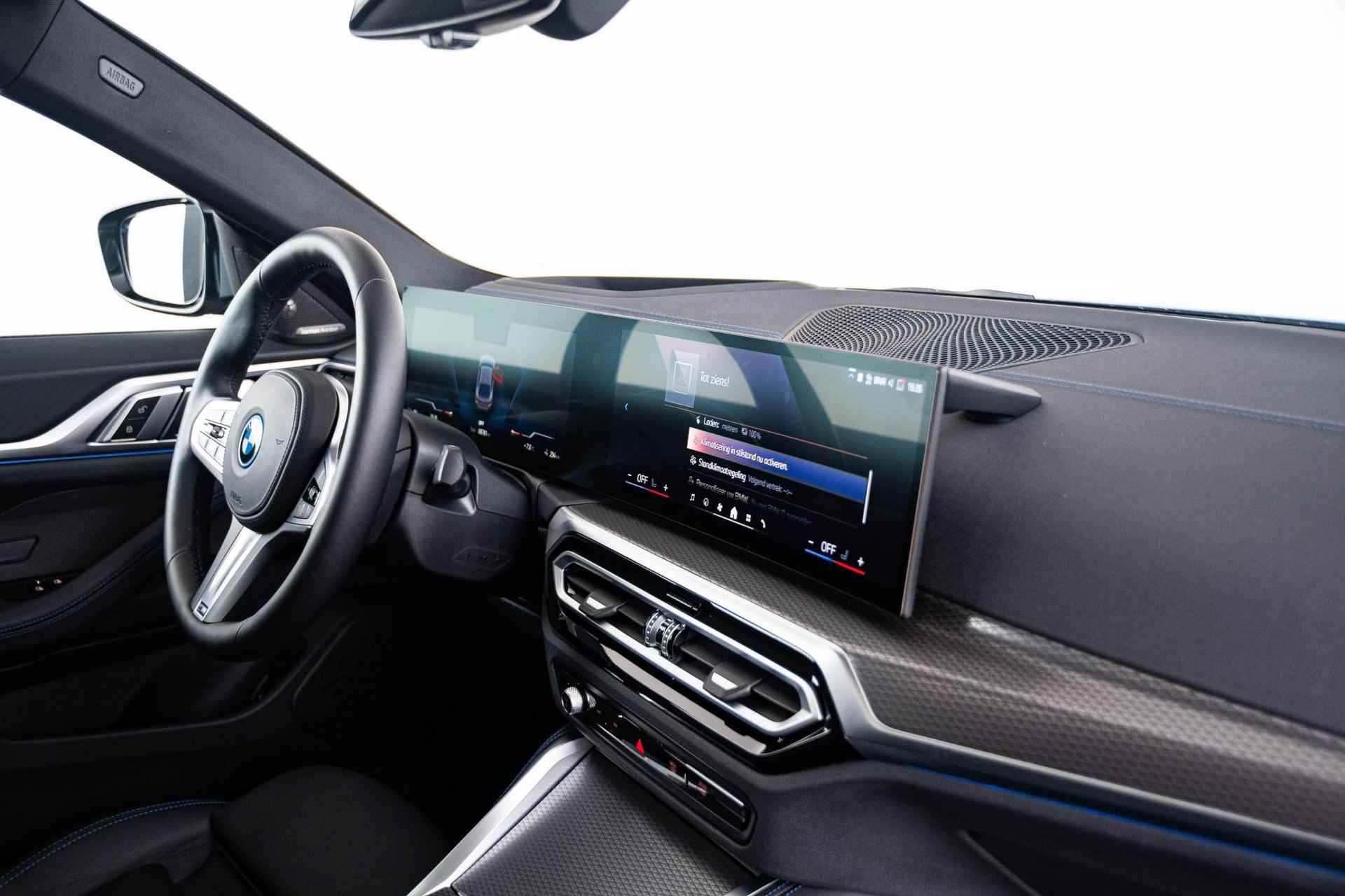 BMW i4 eDrive40 High Executive 84 kWh M-sport - Schuifdak - Harman Kardon - Laserlight - Active Cruise Control - Parking Assistant Plus - Lendensteun - 19 inch - Leder - 34/65