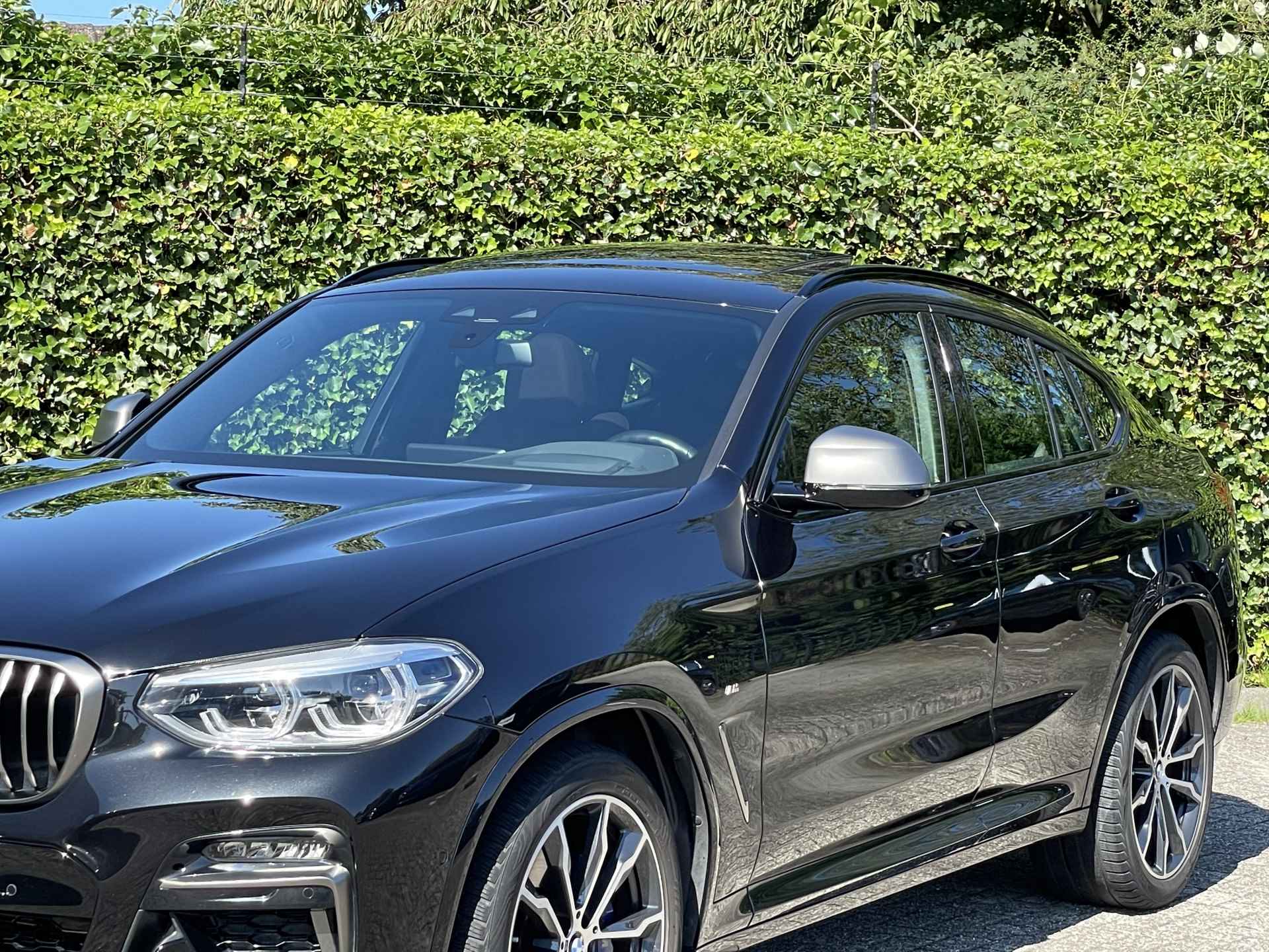 BMW X4 M40i | Panorama | Trekhaak | Camera | 20" | Head up | Elek. stoelverst. - 4/36