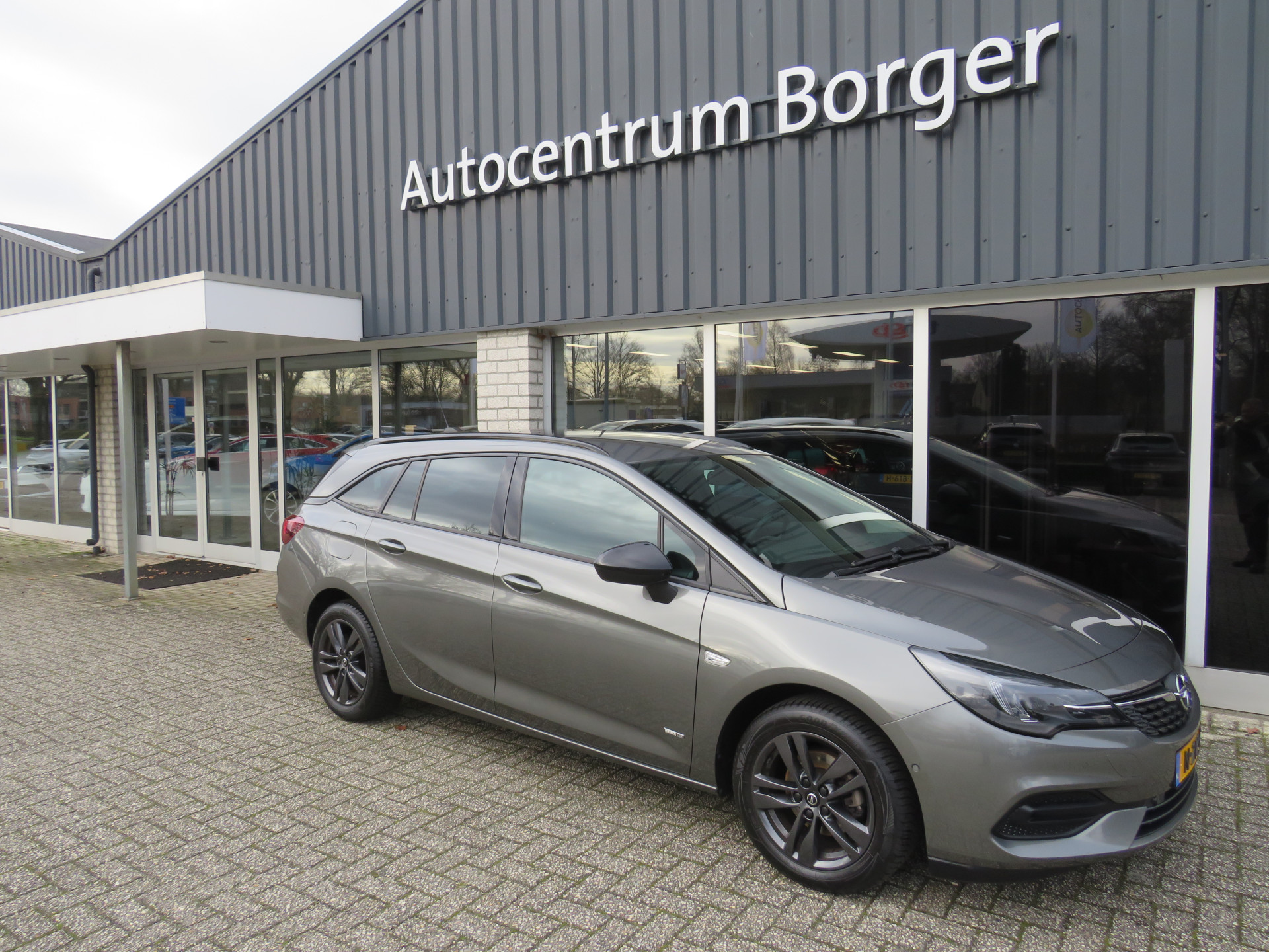 Opel Astra Sports Tourer 1.2 Design & Tech navi/clima/16"LM /cruise/camera bij viaBOVAG.nl