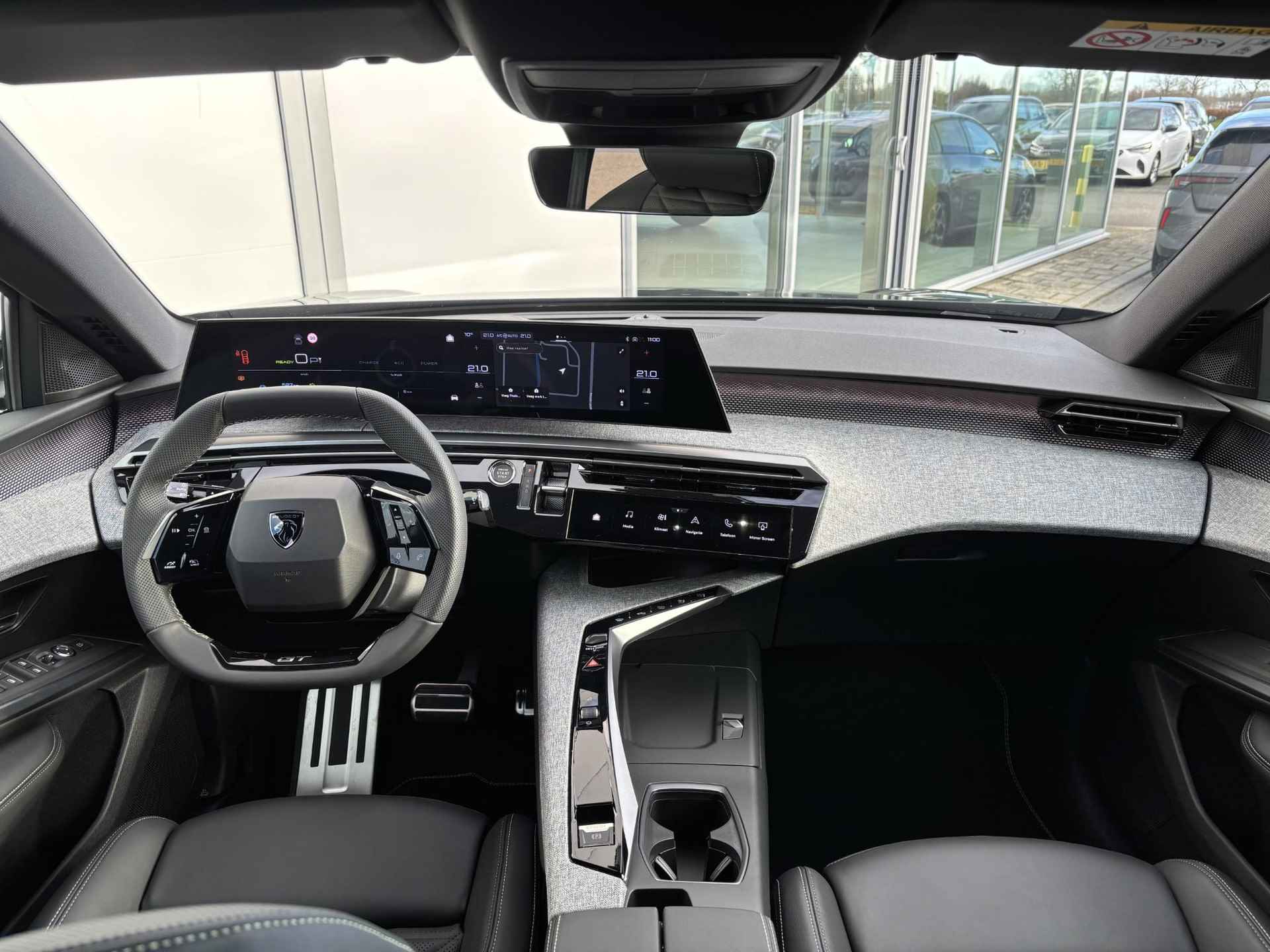 Peugeot e-3008 GT Avantage 73 kWh | WARMTEPOMP | LEDER INTERIEUR | STOEL+STUURVERWARMING | NAVIGATIE | 20"LMV | - 4/27