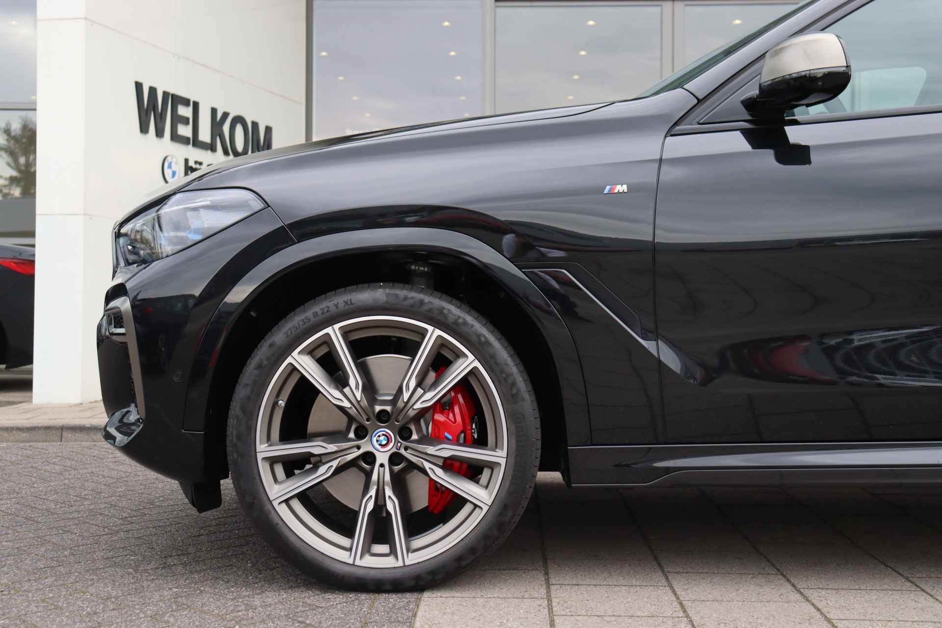 BMW X6 M50i High Executive Automaat / BMW M 50 Jahre uitvoering / Panoramadak Sky Lounge / Trekhaak / Active Steering / Stoelventilatie / Laserlight / Head-Up / Harman Kardon - 4/37