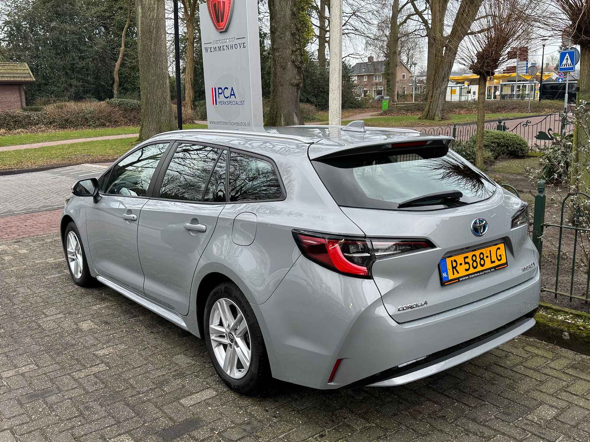 Toyota Corolla Touring Sports 1.8 Hybrid Bus. Edition Automaat Airco/Navi/Camera/Lichtmetalen velgen - 35/41