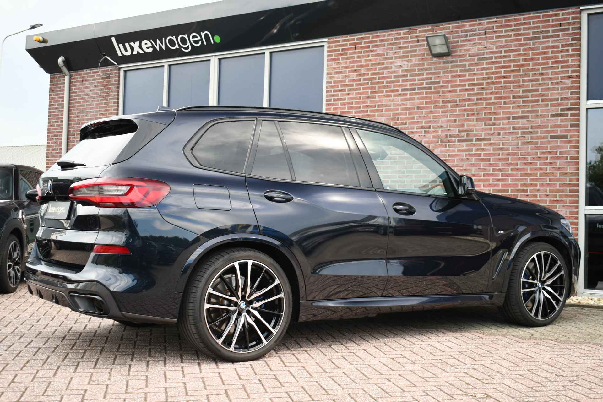 BMW X5 xDrive45e M-Sport M-zetels Pano Trekh Soft-close 360 HUD 22inch Laser - 22/42