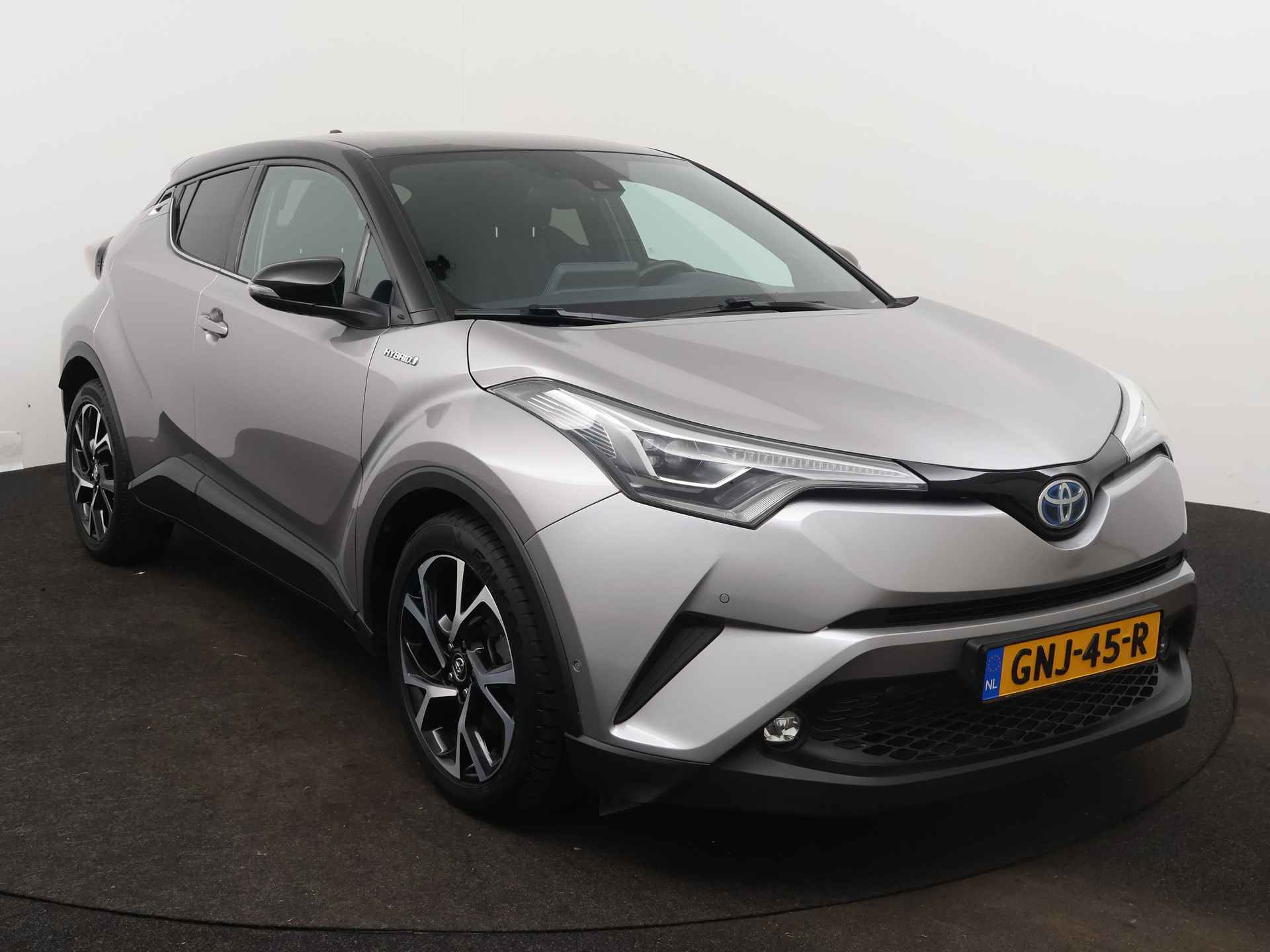 Toyota C-HR 1.8 Hybrid Bi-tone | Navigatie | JBL-audio | Stoel- en stuurverwarming | - 28/45