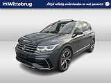 Volkswagen Tiguan 1.4 TSI eHybrid 2x R-Line / AUTOMAAT/ PANO/ TREKHAAK/ CAMERA/ PARK. SENSOREN/ DCC/ MATRIX/ HEAD-UP DISPLAY/ KEYLESS/ DODE HOEK/ STUUR-STOELVERWARM./ ADAPT. CRUISE/ APP-CONNECT/ NAVI/ CLIMA/ DAB/ 20" LMV