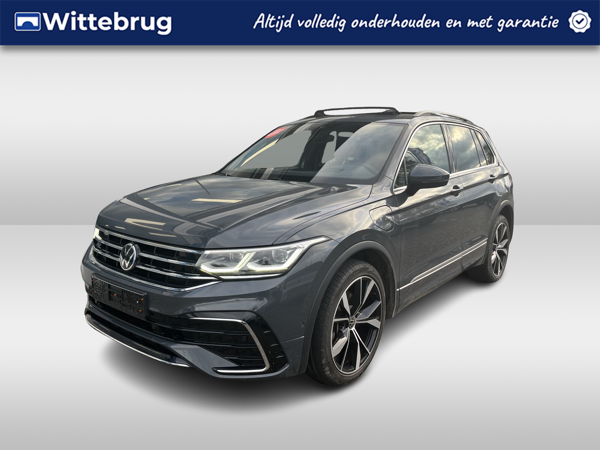 Volkswagen Tiguan 1.4 TSI eHybrid 2x R-Line / AUTOMAAT/ PANO/ TREKHAAK/ CAMERA/ PARK. SENSOREN/ DCC/ MATRIX/ HEAD-UP DISPLAY/ KEYLESS/ DODE HOEK/ STUUR-STOELVERWARM./ ADAPT. CRUISE/ APP-CONNECT/ NAVI/ CLIMA/ DAB/ 20" LMV