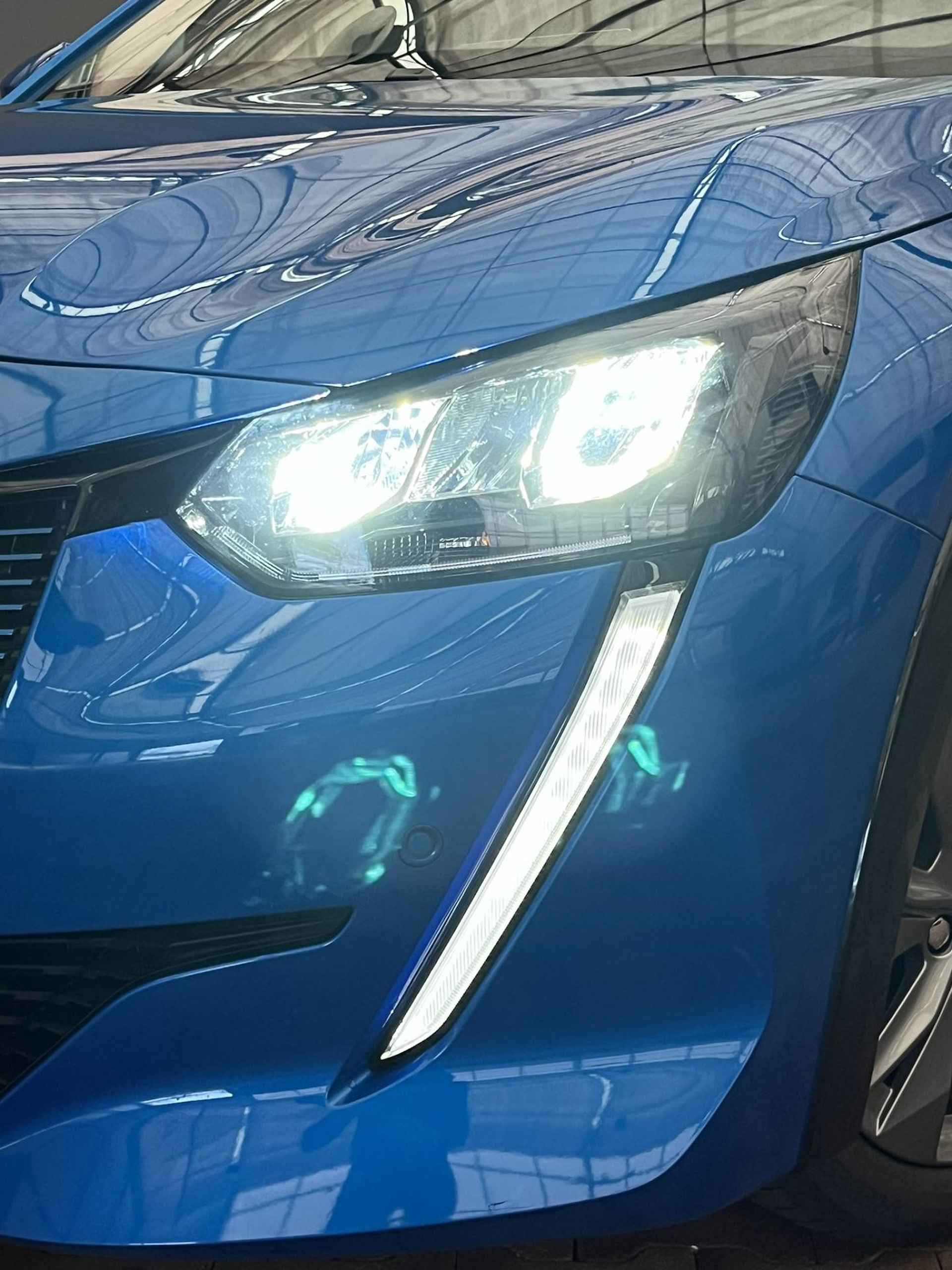 Peugeot e-208 Allure Première | Stoelverwarming | Climate Controle | Keyless | Parkeersensoren voor en achter | Apple Carplay/Android Auto |  LED koplampen | 16'' Lichtmetalen velgen | - 7/45