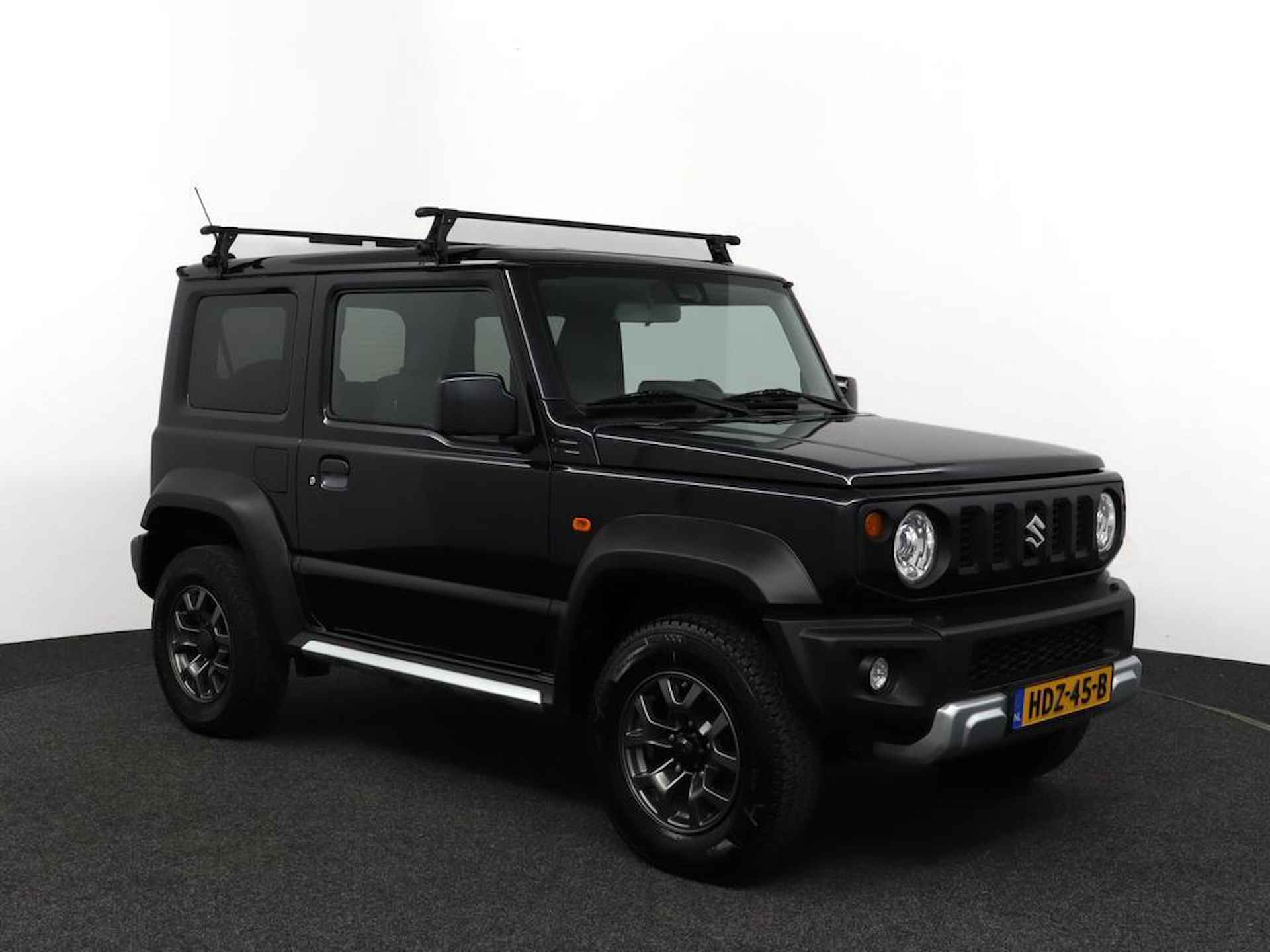 Suzuki Jimny 1.5 Stijl | Climate control | Cruise control | Navigatie | 4 persoons | Lichtmetalen Velgen | Stoelverwarming | - 13/45