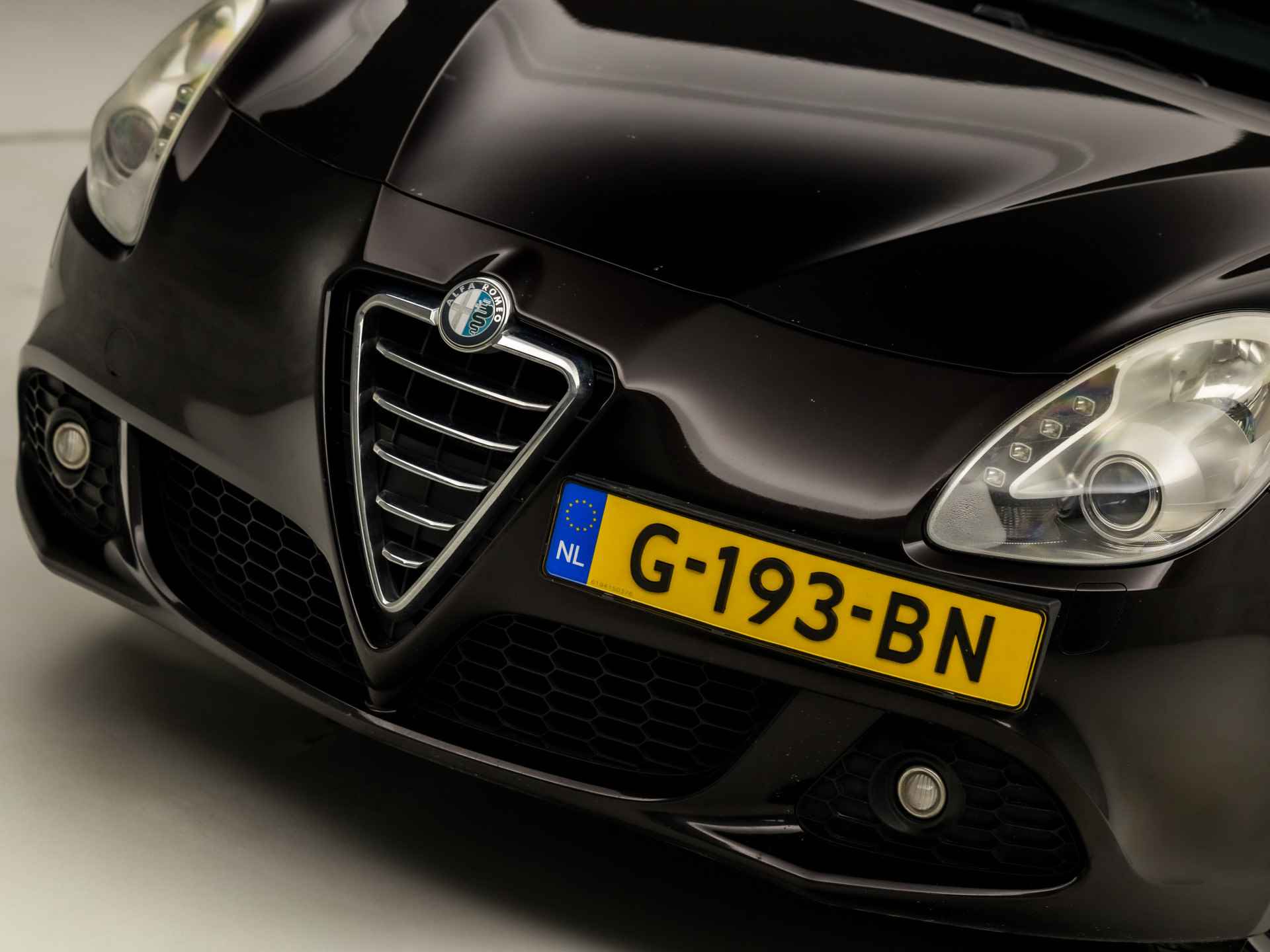 Alfa Romeo Giulietta 1.4 T Distinctive 170Pk Automaat (NAVIGATIE, CLIMATE, STOELVERWARMING, LEDEREN SPORTSTOELEN, XENON, CRUISE, LM VELGEN, NIEUWE APK, NIEUWSTAAT) - 27/31