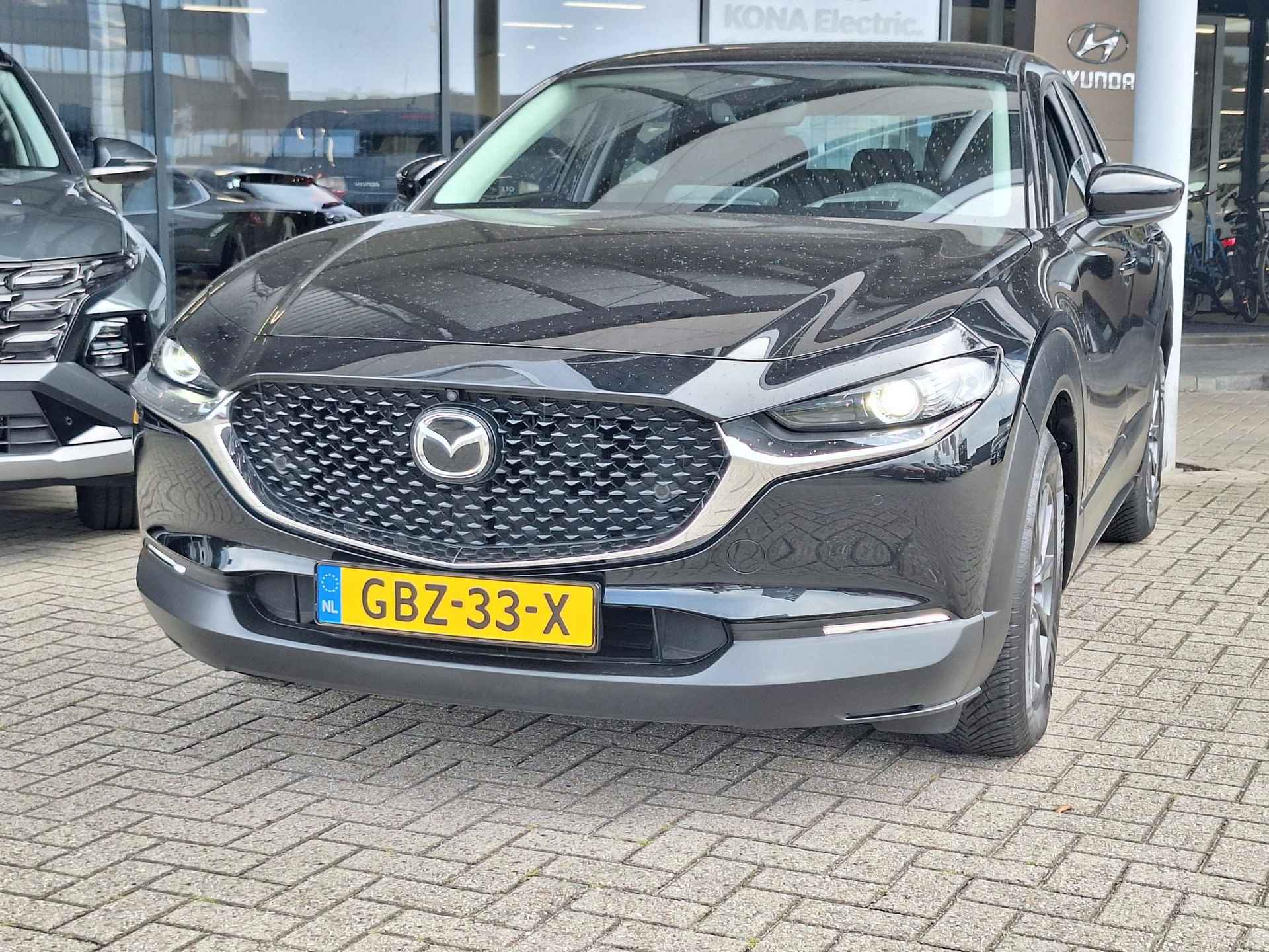 Mazda CX-30 2.0 e-SkyActiv-G M Hybrid Comfort | Rijklaarprijs! | trekhaak | Climate Control | Navigatie | Cruise Control | Stoel-Stuurverwarming | Inclusief 36 mnd Garantie! | - 6/37