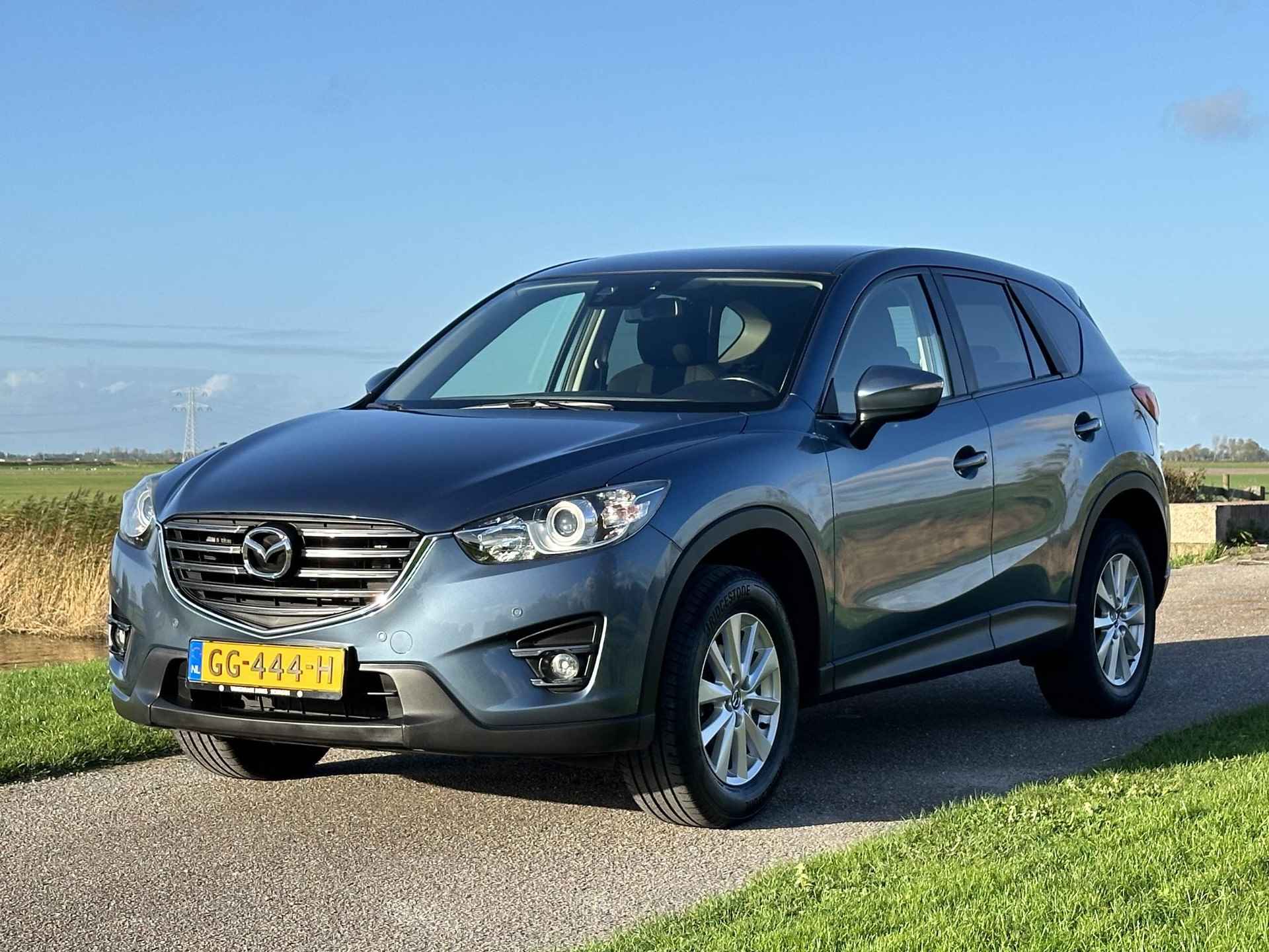 Mazda CX-5 2.0 SkyActiv-G 165 pk Aut. ✅ Navi ✅ Clima ✅ Camera - 28/34