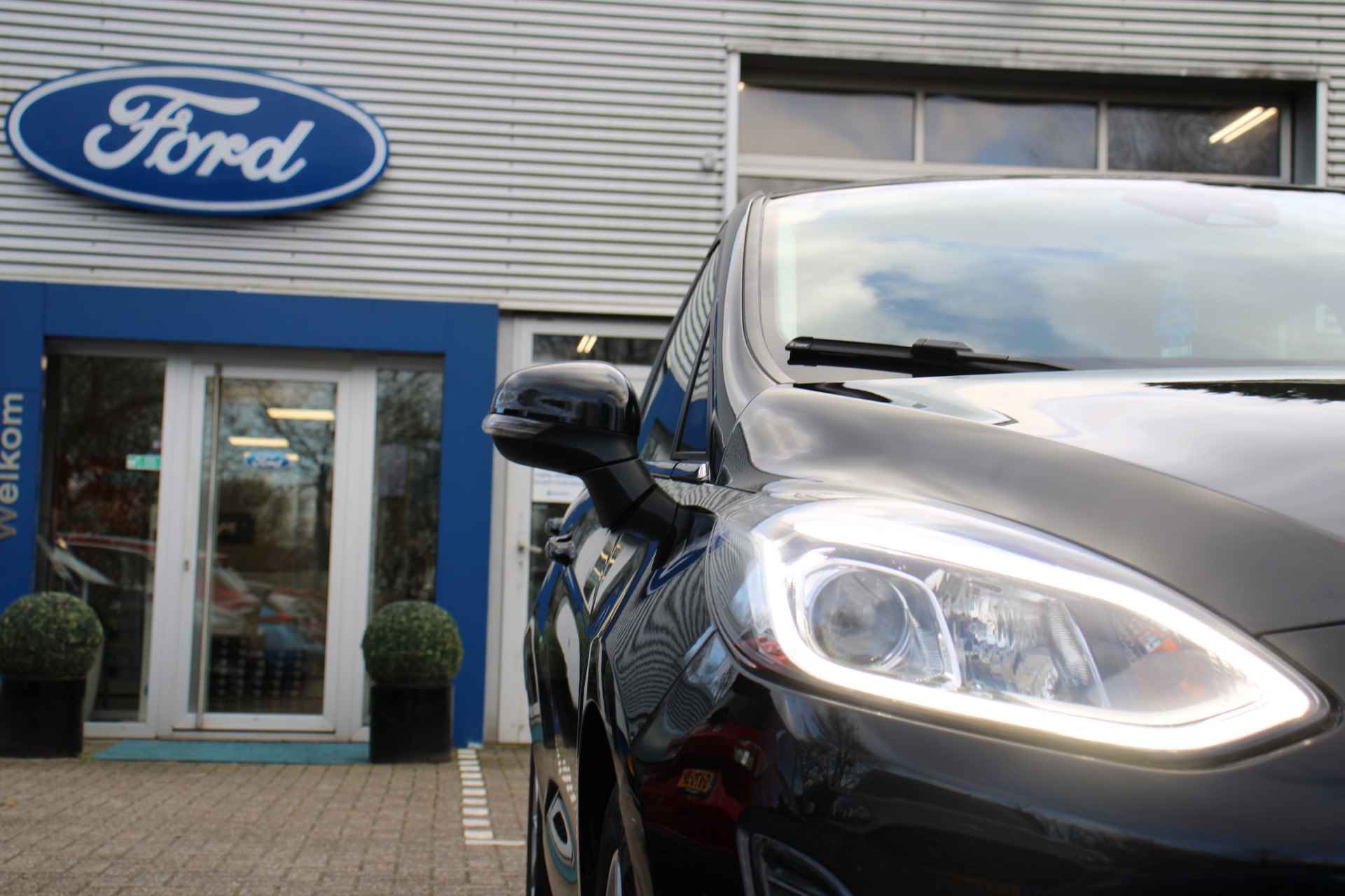 Ford Fiesta 1.0EB TITANIUM | NAVI | CAMERA | CLIMA | STOELVERWARMING | CRUISE | AUTO. INPARKEREN | PARK SENS V+A | LM. VELGEN - 21/24