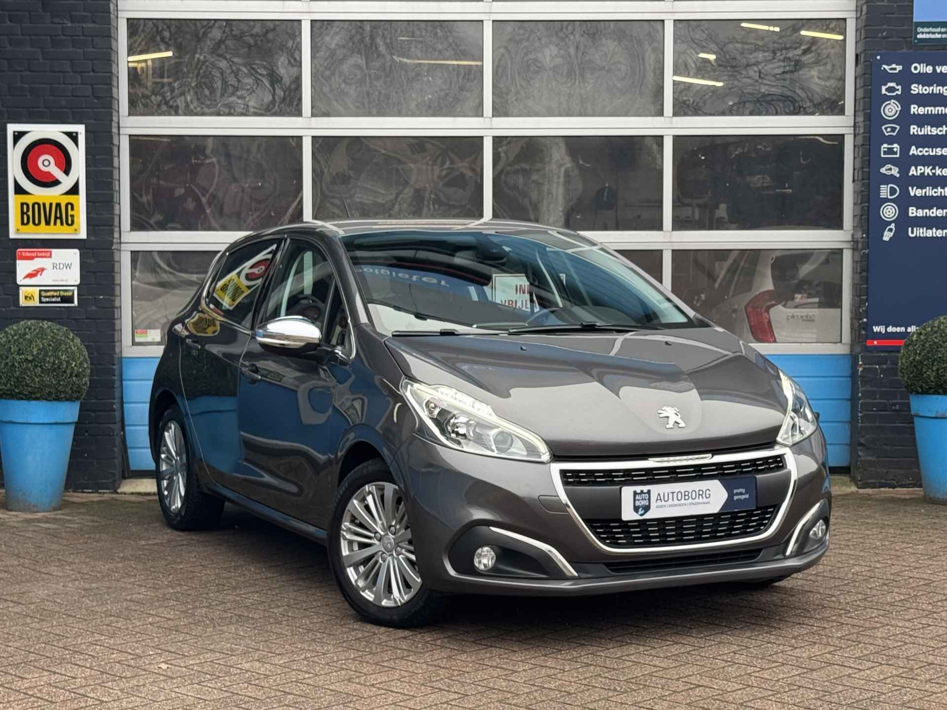 Peugeot 208 1.2 PureTech Allure | Climate Control | Navigatie | Rijklaar + 12 Maand BOVAG Garantie - 30/35