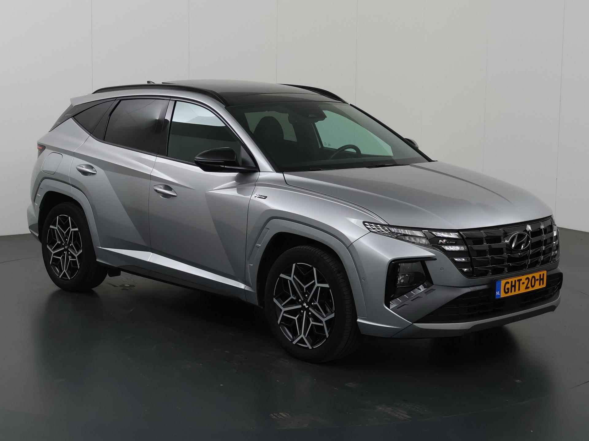 Hyundai Tucson 1.6 T-GDI PHEV N Line Sky 4WD  | Adapieve CruiseControl | 360 Camera | Panoramadak | Ele. verstelbare voorstoelen + Geheugen | Groot Navigatie | Apple CarPlay | Stoelverwarming + Koeling | - 24/48