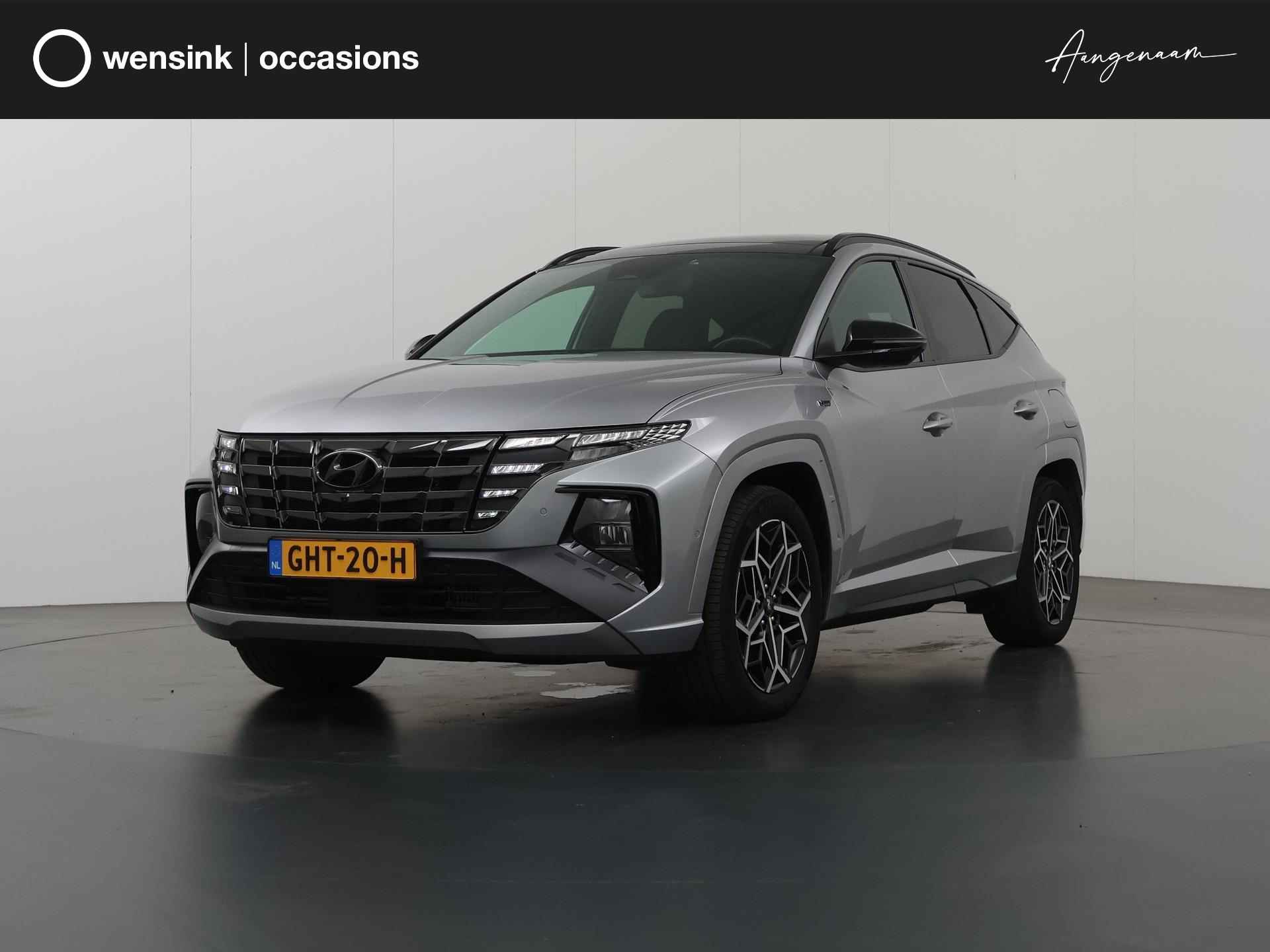 Hyundai Tucson 1.6 T-GDI PHEV N Line Sky 4WD  | Adapieve CruiseControl | 360 Camera | Panoramadak | Ele. verstelbare voorstoelen + Geheugen | Groot Navigatie | Apple CarPlay | Stoelverwarming + Koeling | - 1/48