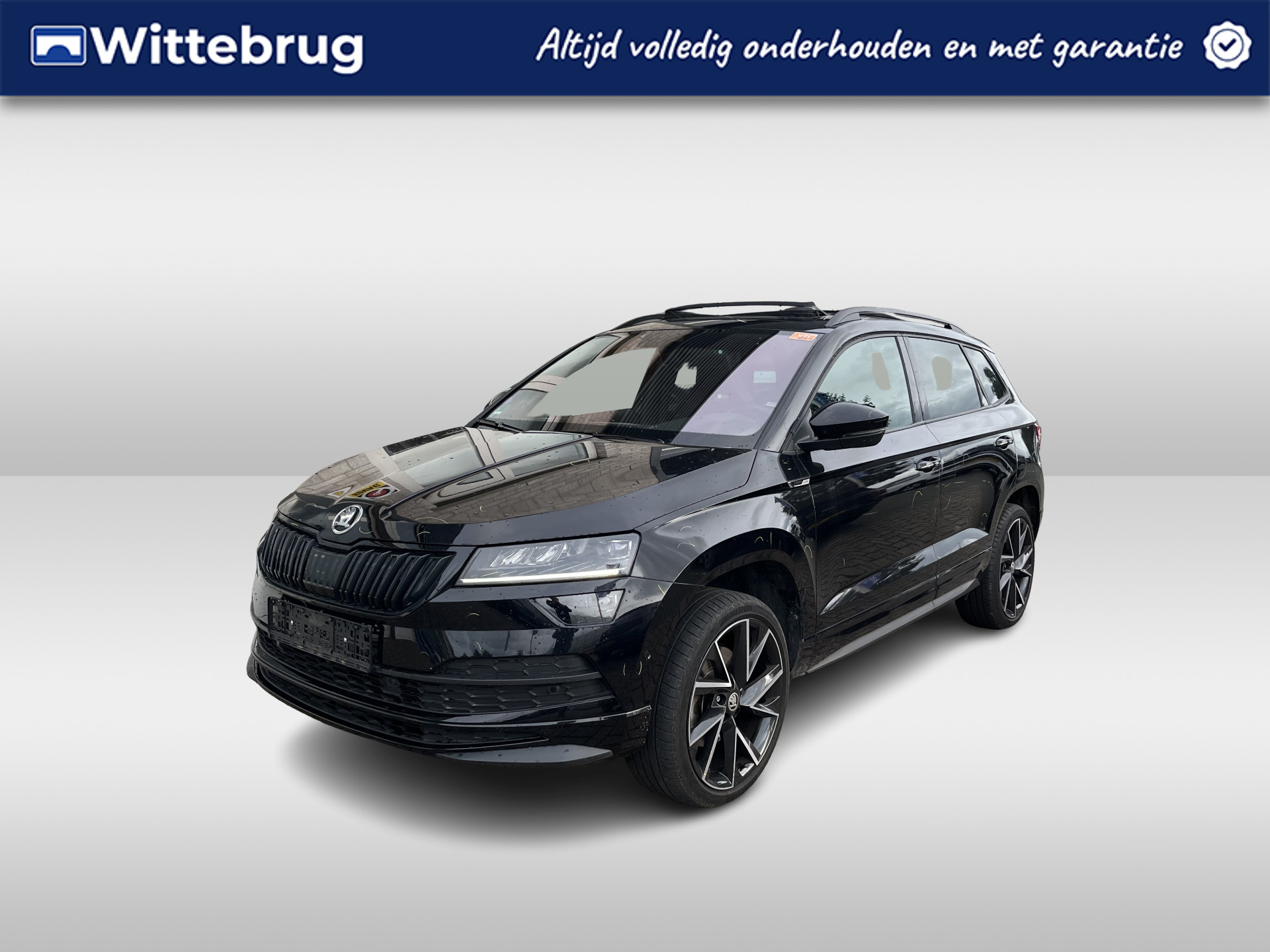 Škoda Karoq 1.5 TSI ACT Sportline / AUTOMAAT/ PANO/ TREKHAAK/ CAMERA/ PARK. SENSOREN/ LED/ DODE HOEK/ STOEL VERWARM. V EN A/ KEYLESS/ VIRTUAL COCKPIT/ ADAPT. CRUISE/ APP CONNECT/ NAVI/ CLIMA/ DAB/ 19" LMV/