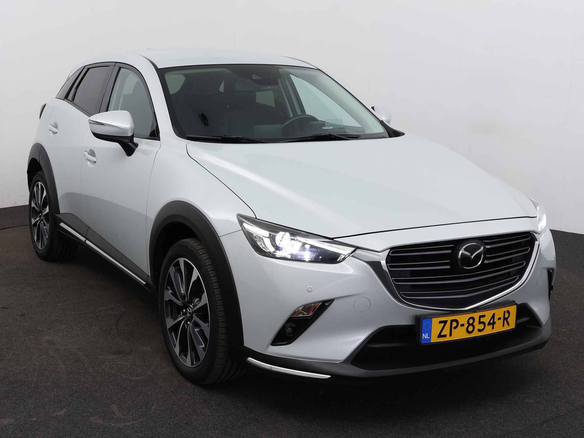 Mazda CX-3 2.0 SkyActiv-G 120 GT-M Limited Navigatie | Achteruitrijcamera | Trekhaak | PDC - 27/43