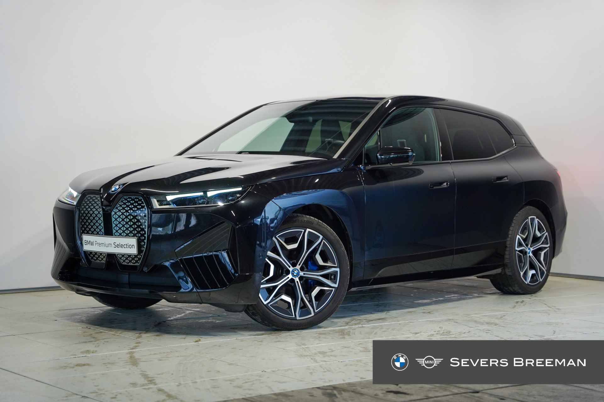 BMW iX xDrive40 Business Edition Plus Sportpakket - 1/28