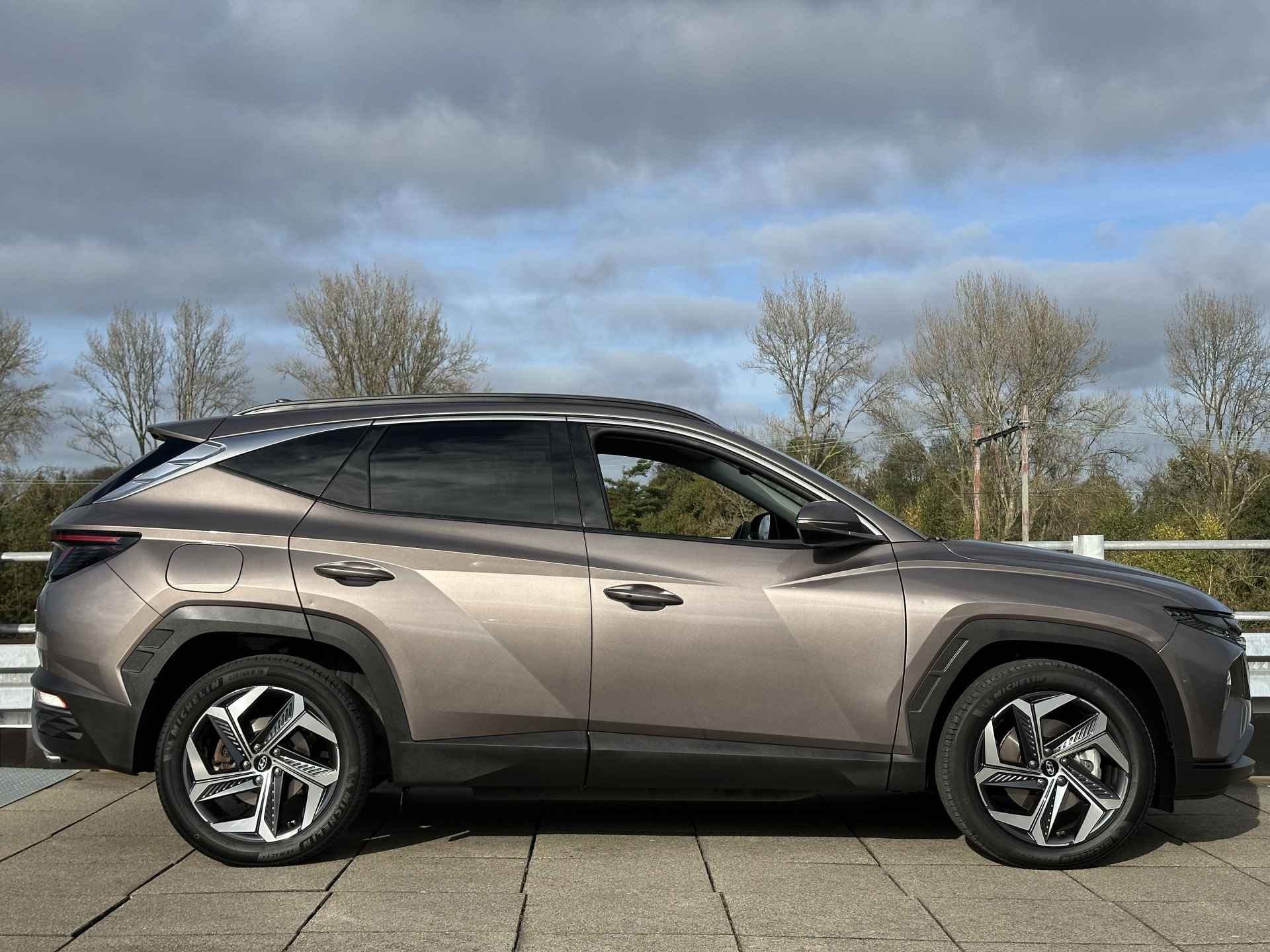 Hyundai Tucson 1.6 T-GDI PHEV Comfort Smart 4WD | Navigatiesysteem | Elektrische achterklep | Rijklaarprijs! | - 42/43