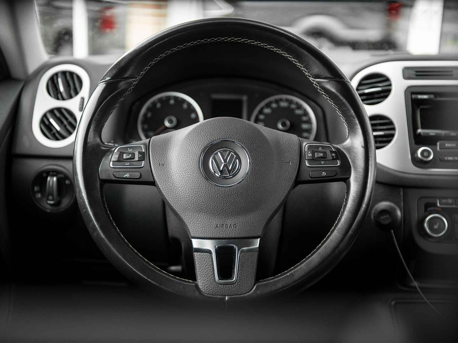 Volkswagen Tiguan 1.4TSi DSG6 Cup Sport&Style | Trekhaak 1.800kg. | 2e eigenaar | Climate Control | Stoelverwarming | Parkeer pakket | Winter-pakket | Koplampsproeiers | Multifunctioneel lederen stuurwiel - 46/47
