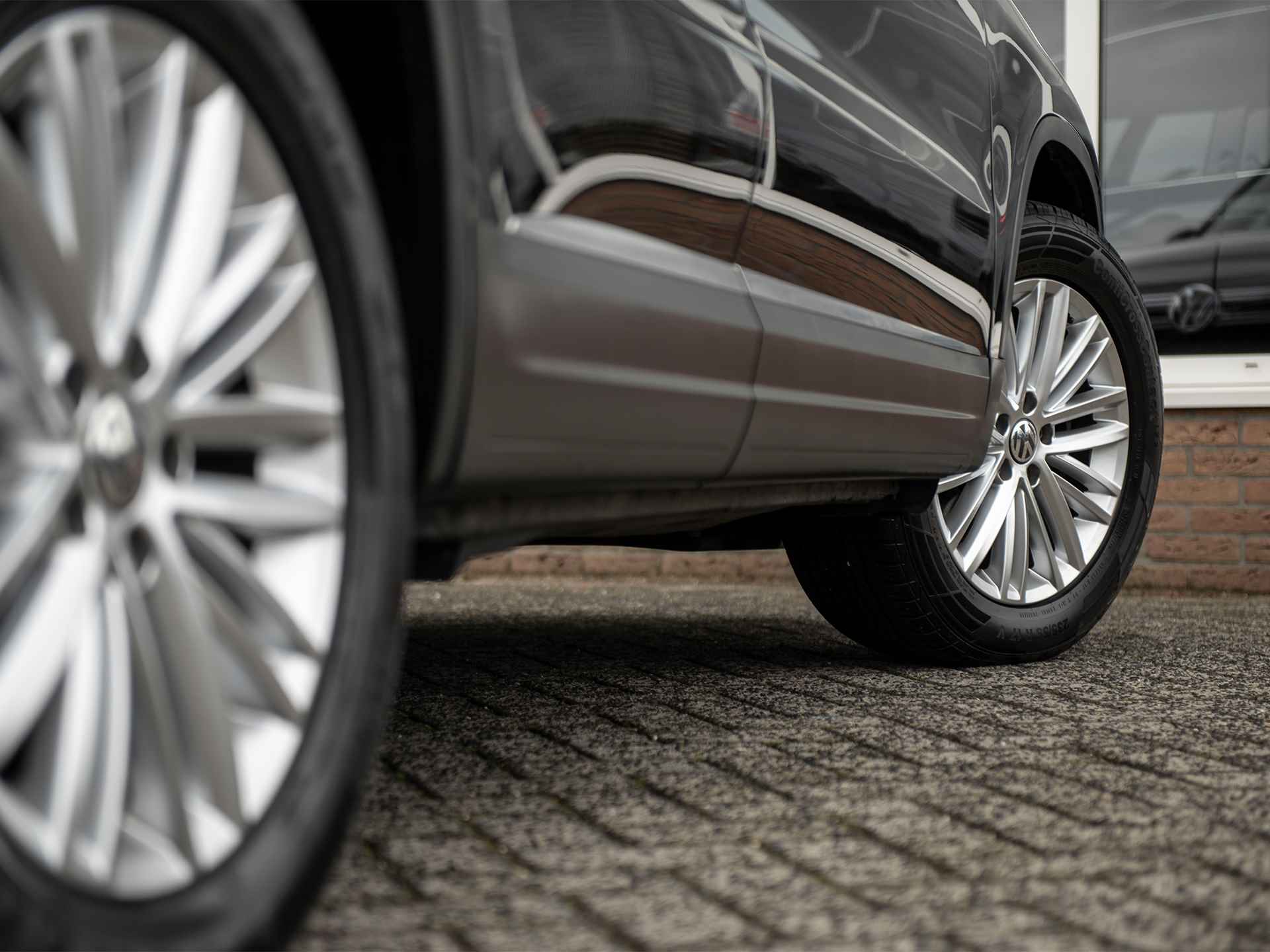 Volkswagen Tiguan 1.4TSi DSG6 Cup Sport&Style | Trekhaak 1.800kg. | 2e eigenaar | Climate Control | Stoelverwarming | Parkeer pakket | Winter-pakket | Koplampsproeiers | Multifunctioneel lederen stuurwiel - 31/47