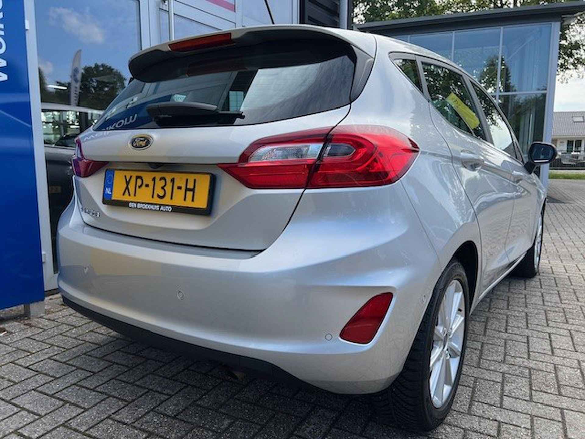 Ford Fiesta 1.0 100 PK Titanium | NAVIGATIE| CLIMATE CONTROL| CRUISE CONTROL| DAB+| PARKEERSENSOREN| 4 SEIZOENEN - 7/31